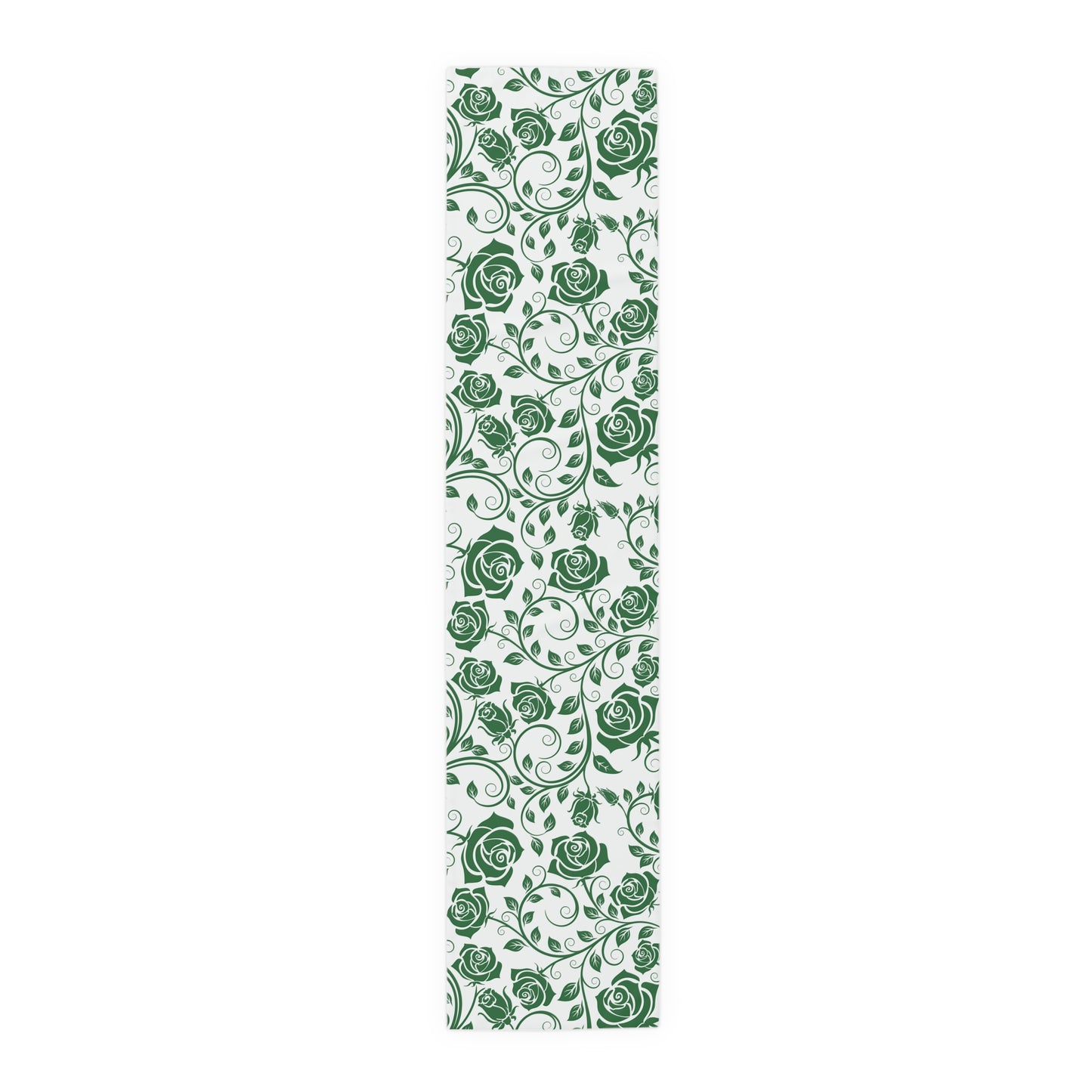 Table runner with green floral pattern on a white background