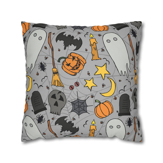 Halloween-themed pillowcase with ghost, pumpkin, and broomstick design printed on front and back of pillow cover with a gray background, on a white background.