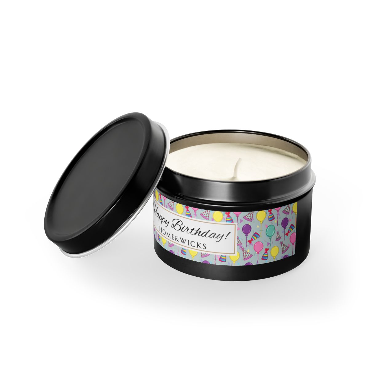Opened cotton wicked black 4 oz. candle tin with 'Happy Birthday' label with colorful design of birthday hats, confetti and balloons on a white background