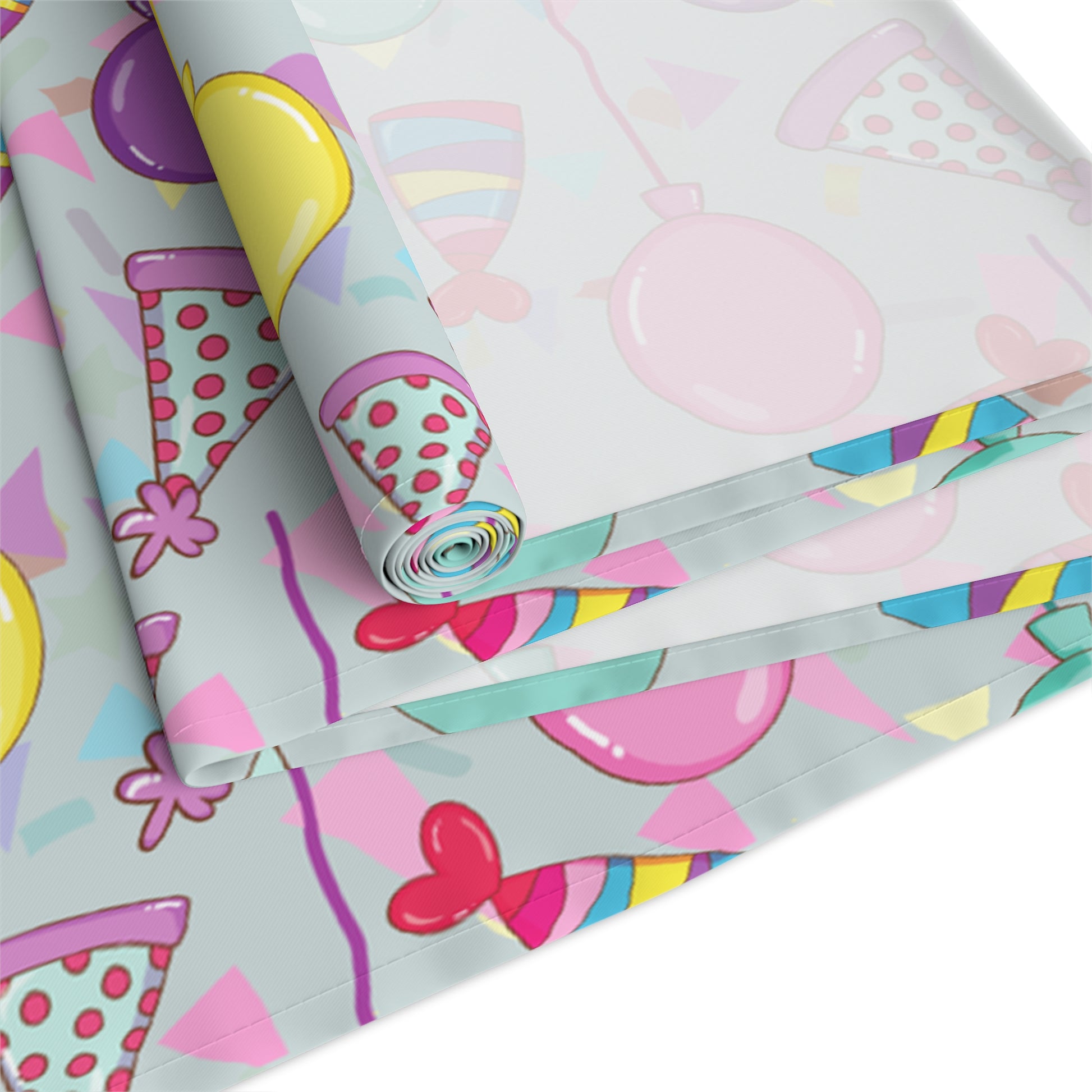 Table runner with colorful birthday party hats, confetti and balloons pattern on a white background