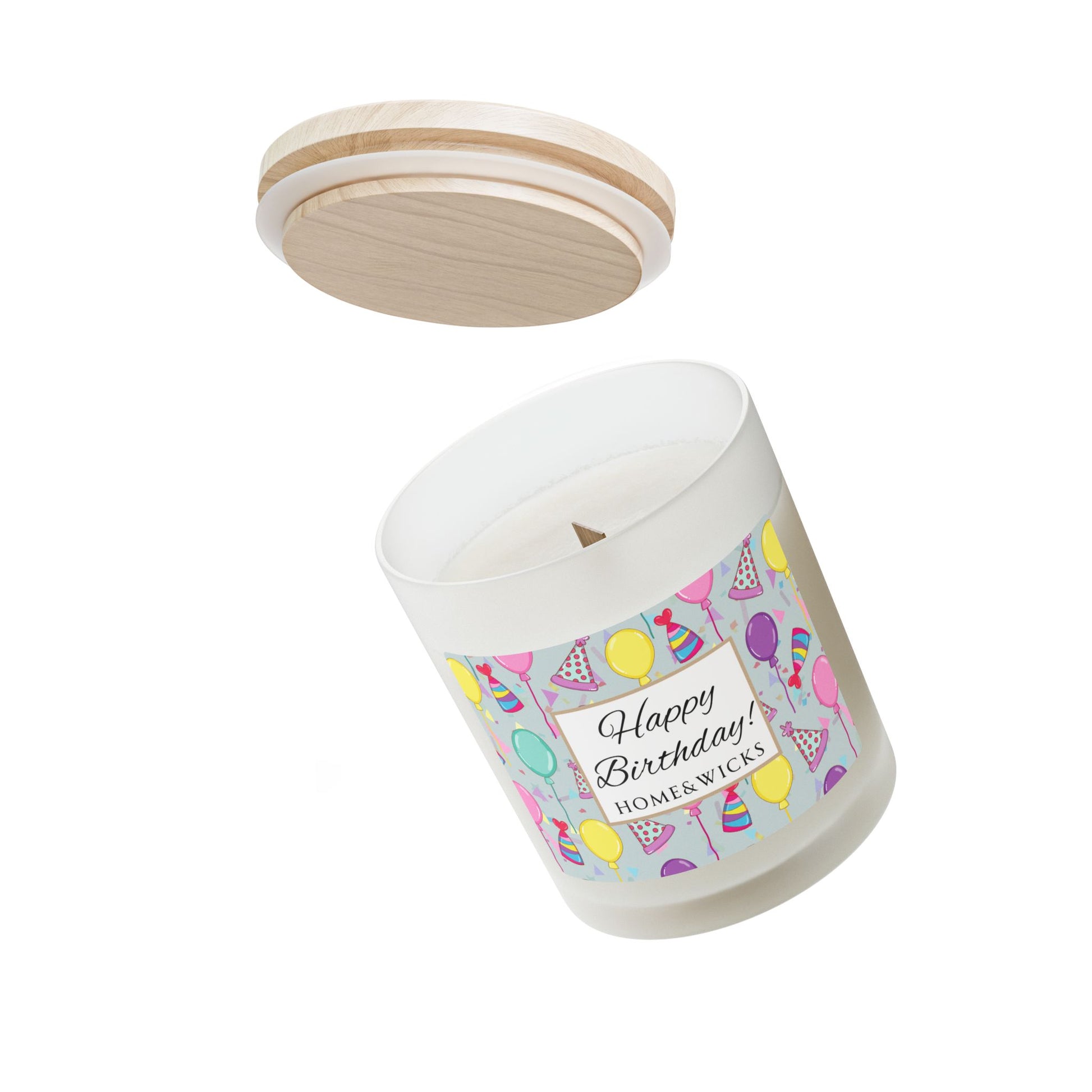 Wood wick candle with a 'Happy Birthday' label featuring balloons and party hats with maple wood lid on a white background.