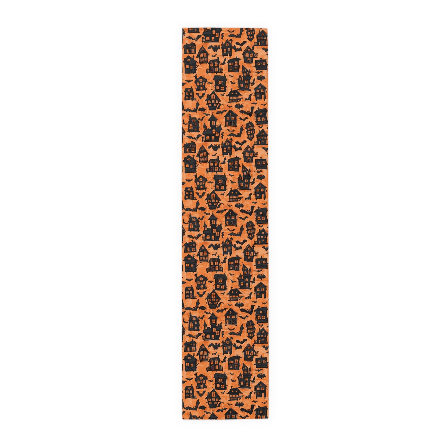 16" x 90" polyester Black Haunted Houses table runner with black haunted houses on an orange background design printed on the table runner on a white background