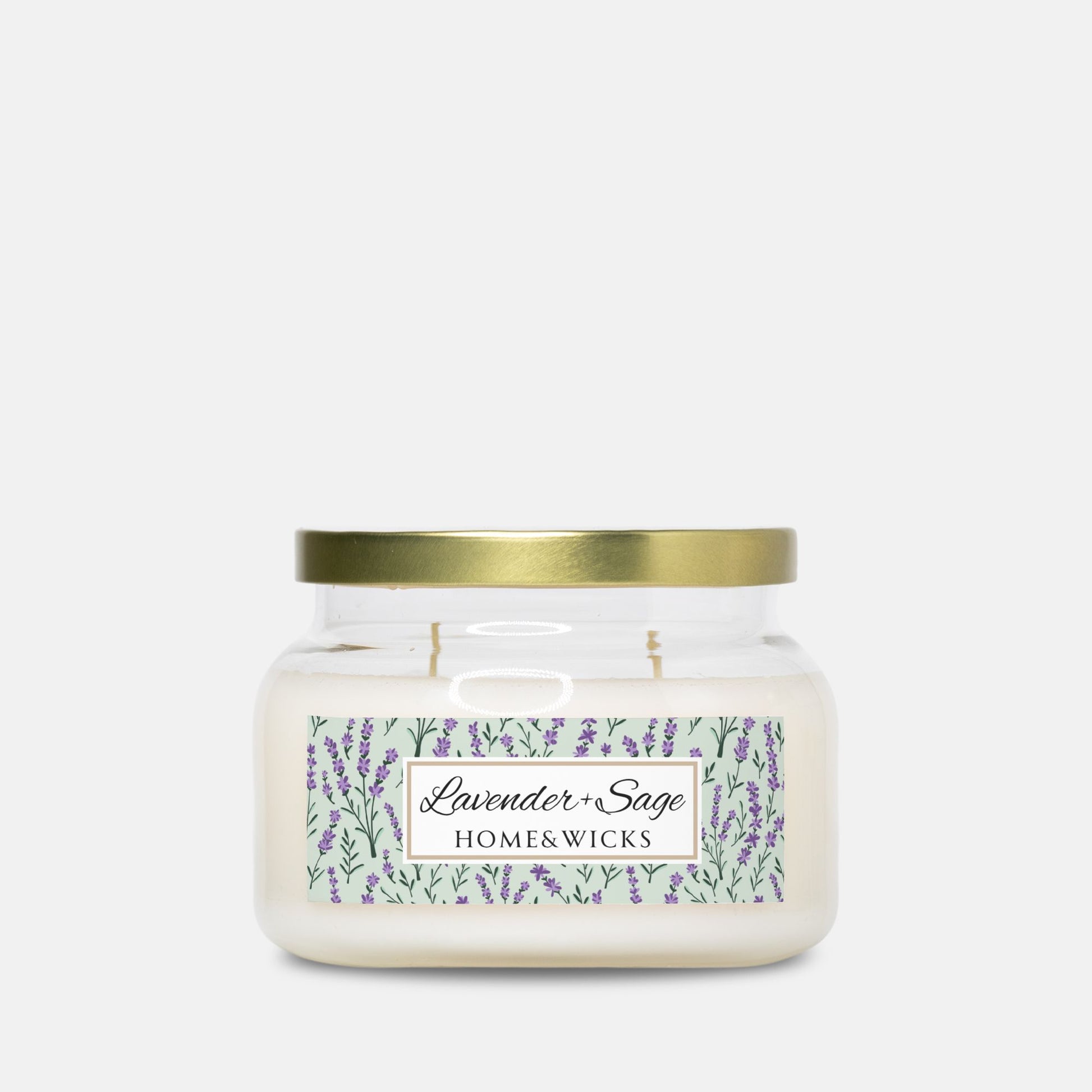 Apothecary candle jar with a gold lid and 'Lavender Sage Home & Wicks' label on a white background