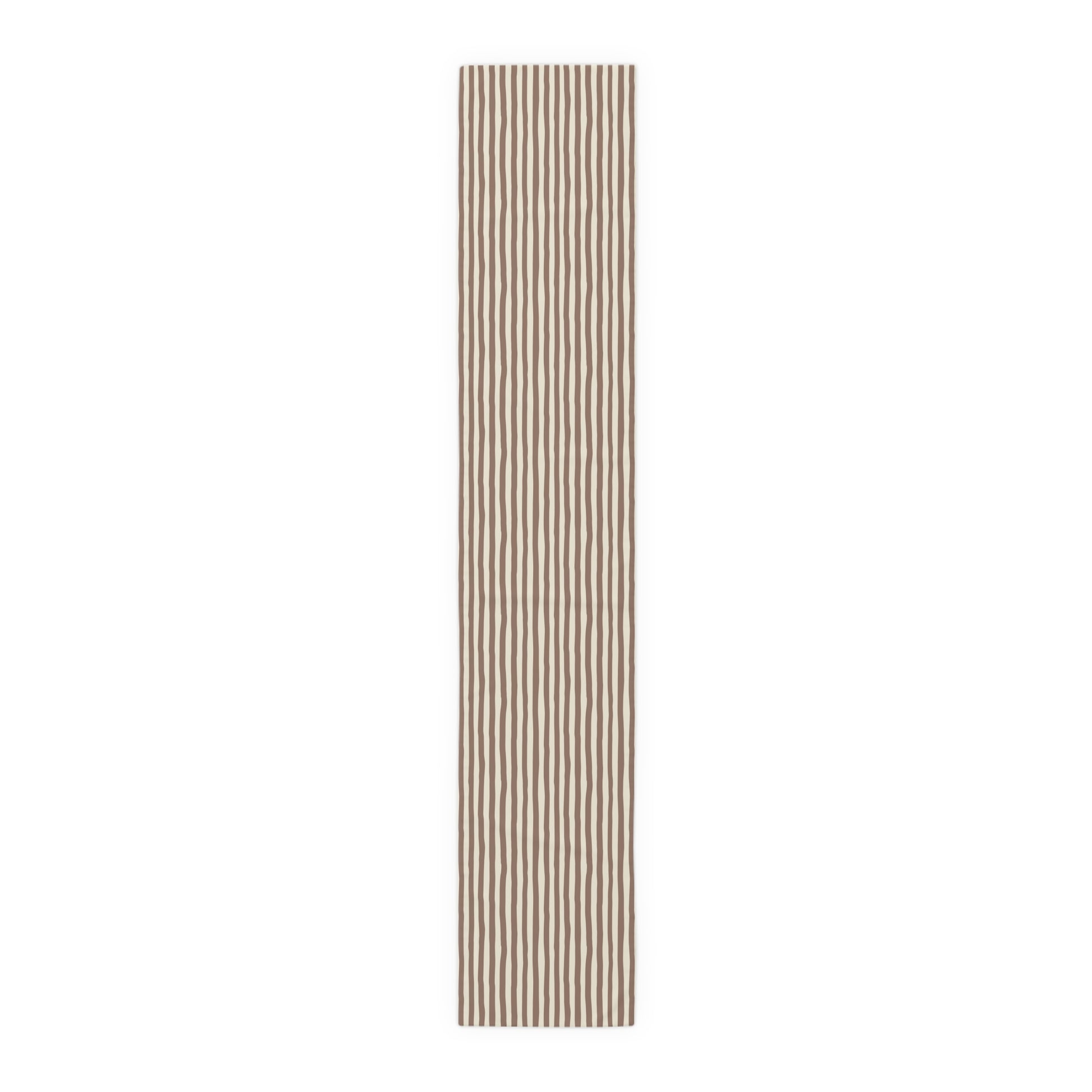 Mocha brown and beige striped table runner with striped pattern on a white background