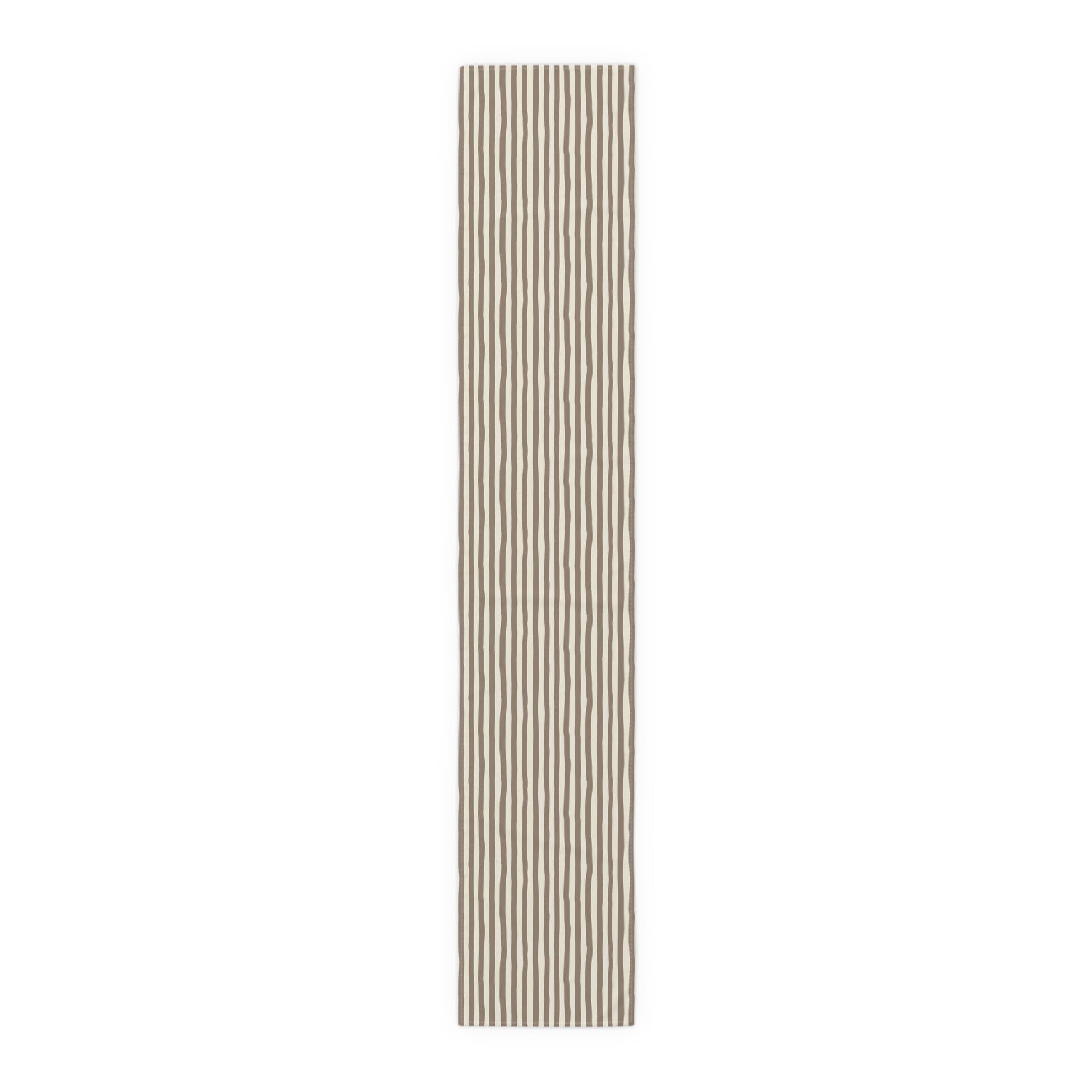 Mocha brown and beige striped table runner on a white background