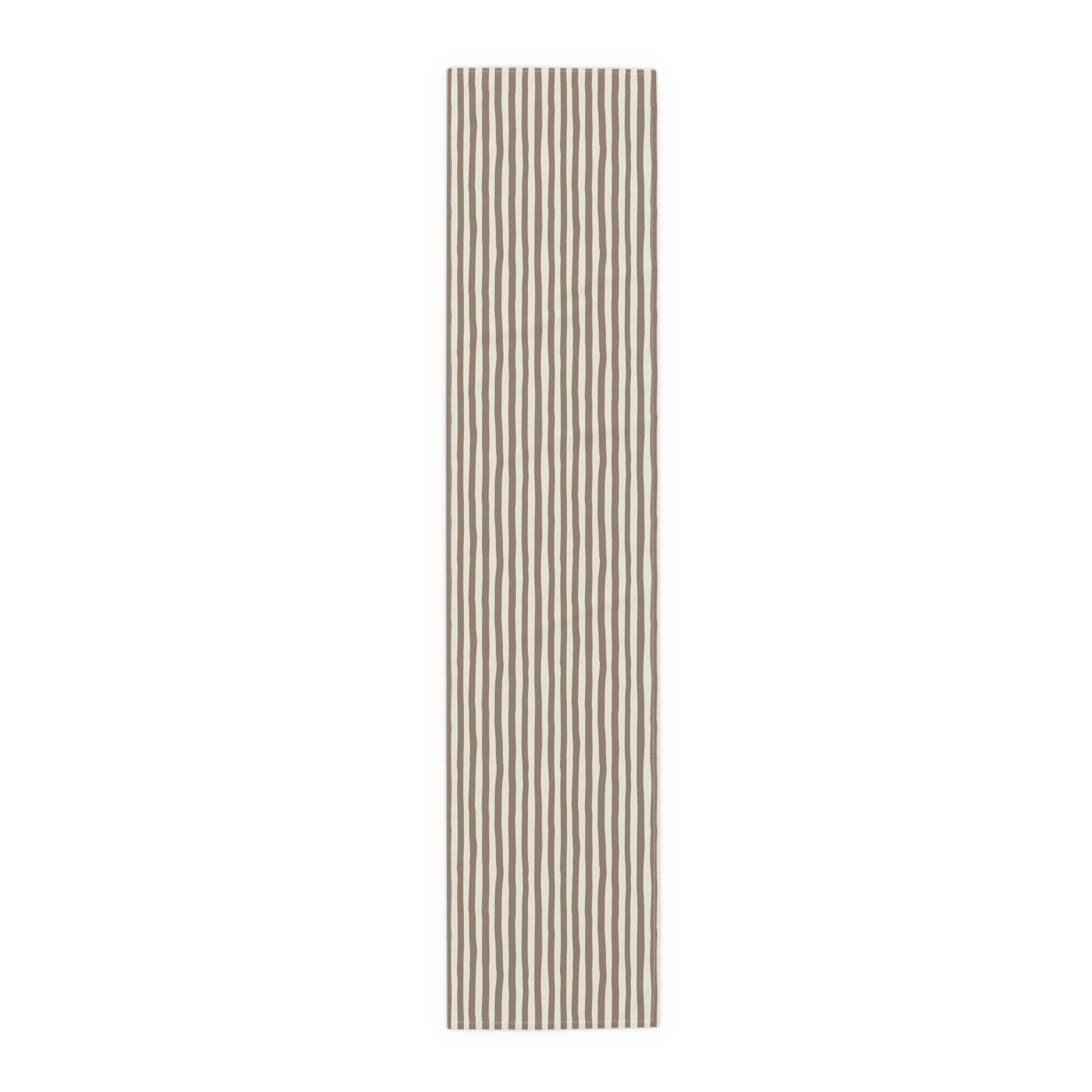 Mocha striped table runner with beige and brown striped pattern on a white background