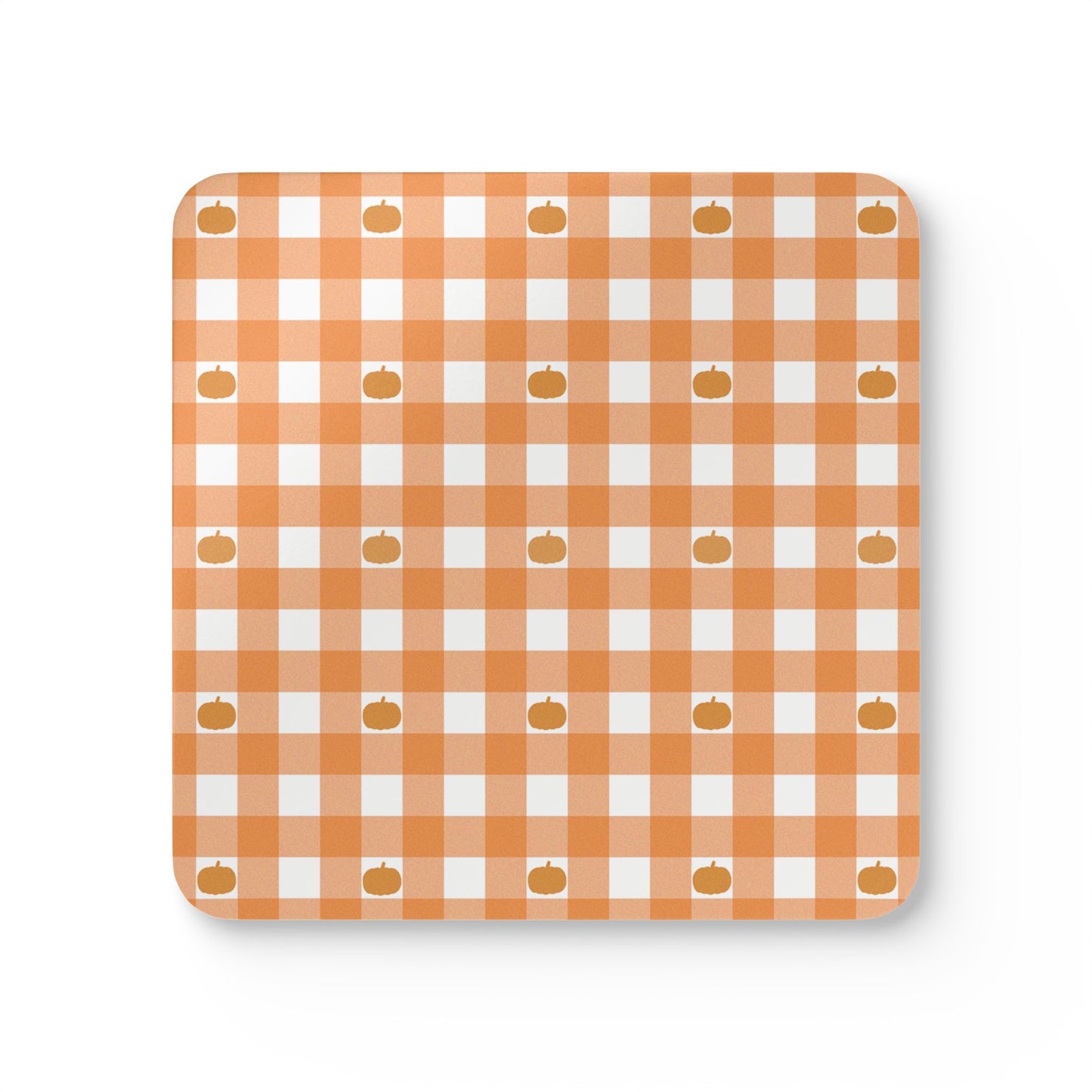 Checkered orange gingham pattern with small pumpkins square coaster on a white background