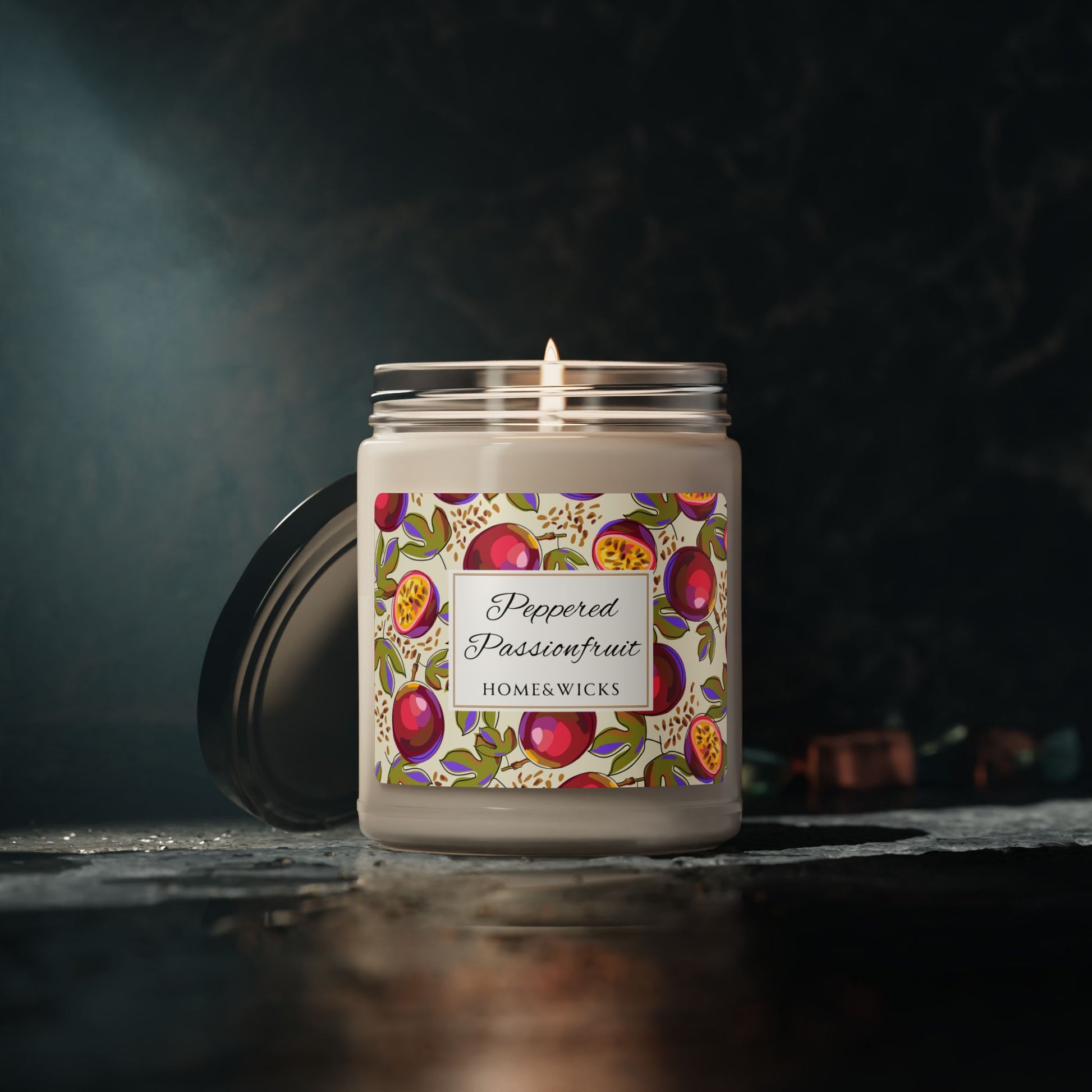 Homewkicks candle with a colorful label on a dark background