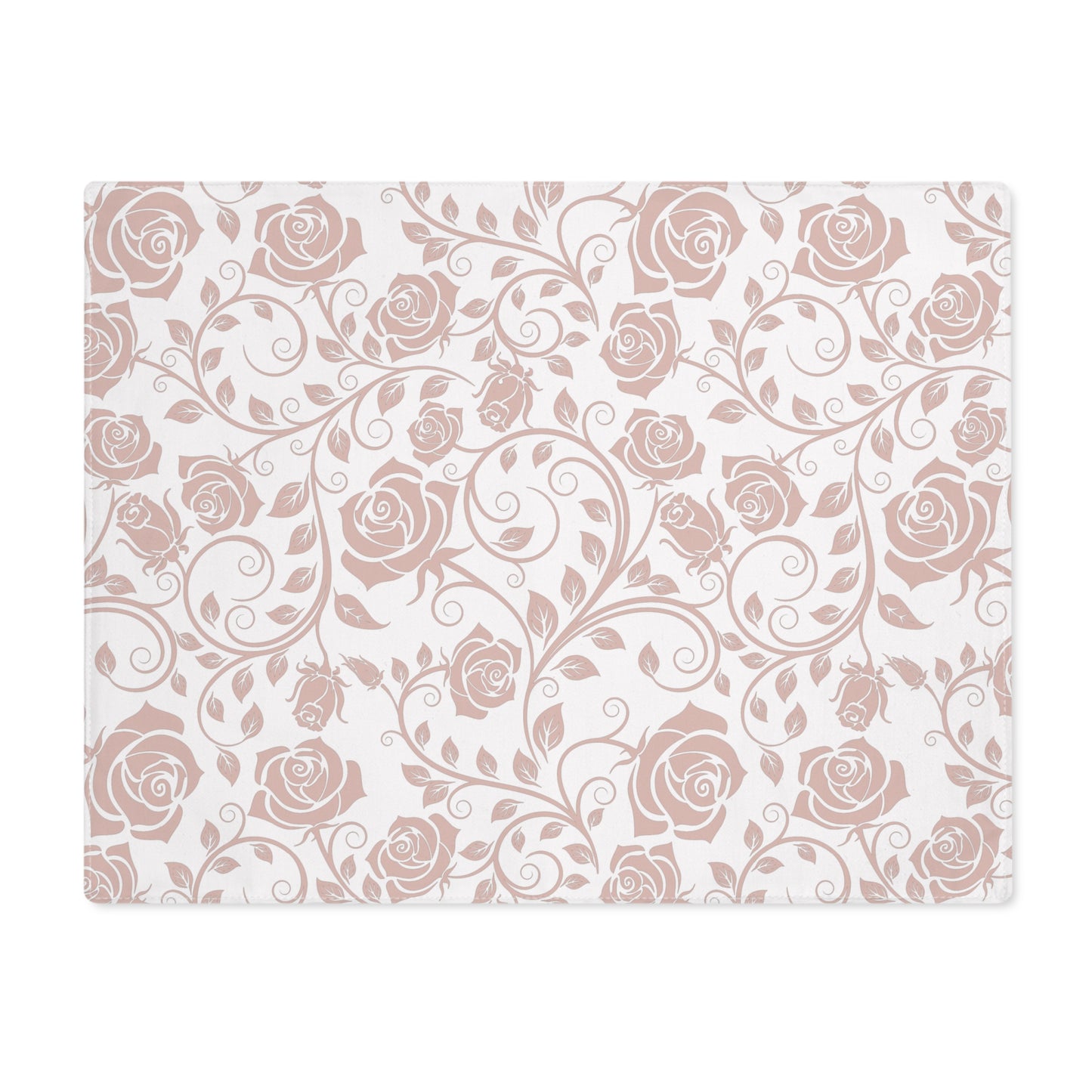 Decorative pink placemat with rose floral pattern on a white background