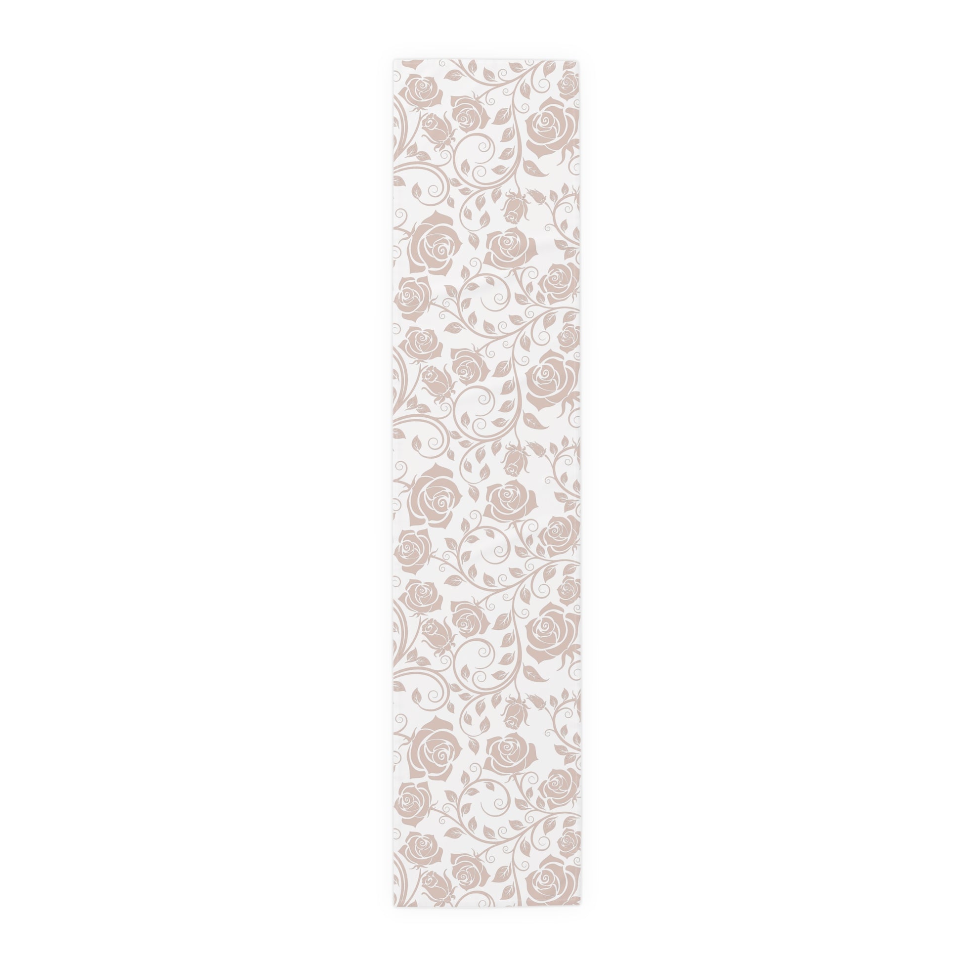 Table runner with pink floral pattern on a white background