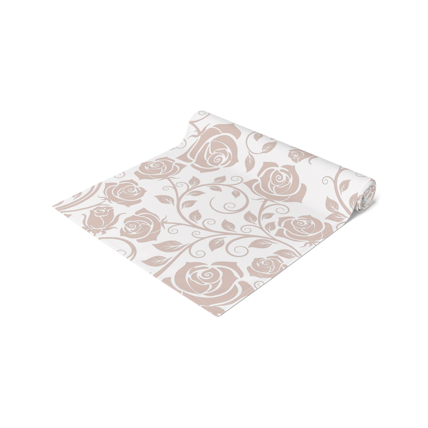 Floral patterned table runner rolled up on a white background