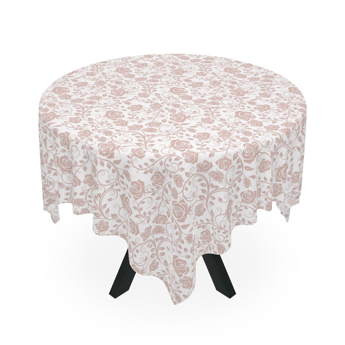Round table with a pink and white floral patterned tablecloth on a white background