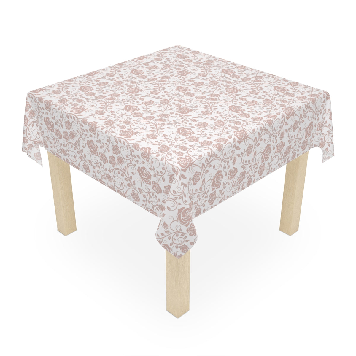 Small wooden table with a pink & white floral-patterned tablecloth on a white background