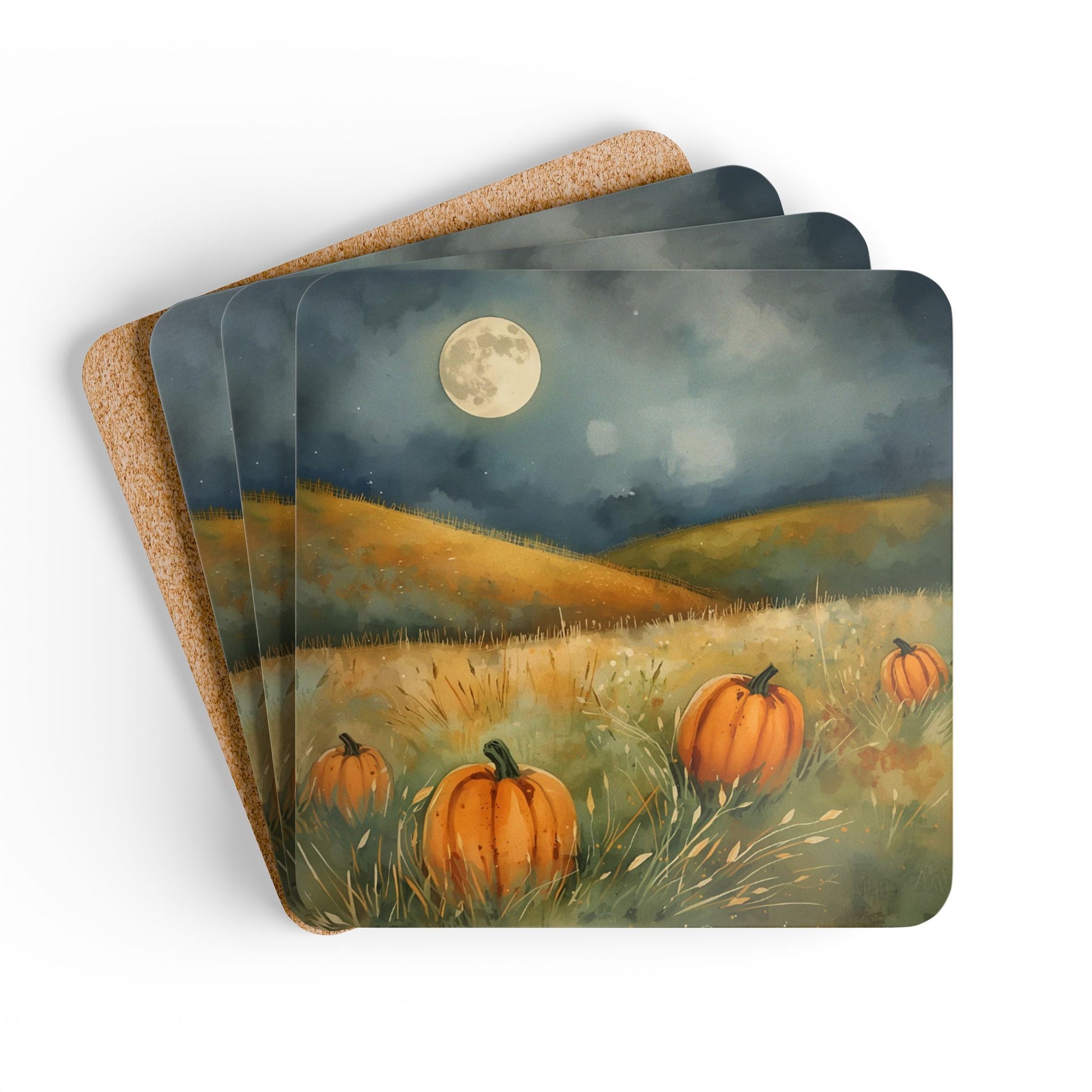 Set of four coasters with pumpkin field and moonlit night sky design on a white background