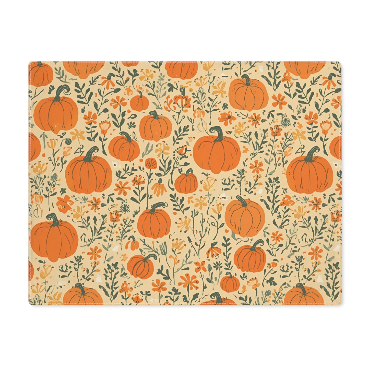 Our Pumpkin Garden placemat has an orange pumpkins and flowers placemat design on a beige background on cotton twill fabric