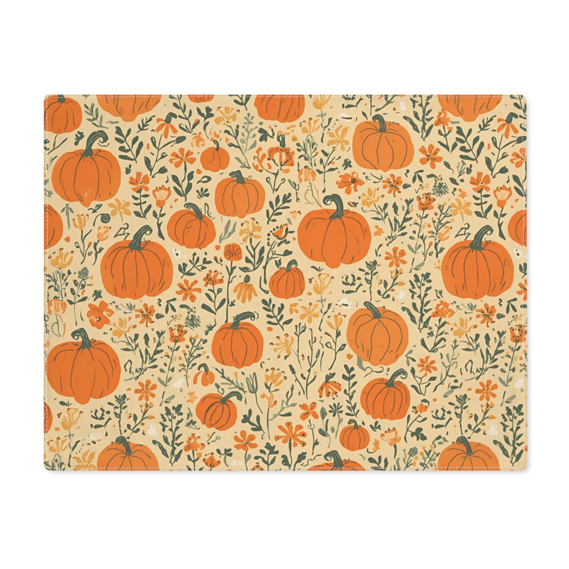 Our Pumpkin Garden placemat has an orange pumpkins and flowers placemat design on a beige background on cotton twill fabric