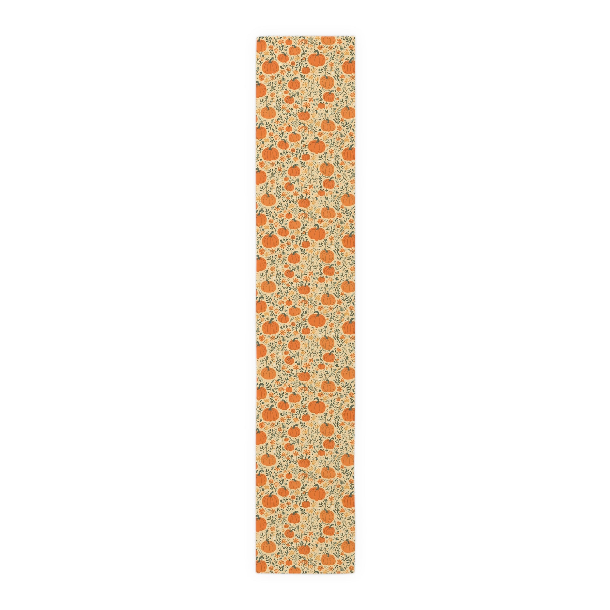 Our cotton twill 16" x 90" Pumpkin Garden table runner has an orange pumpkin and flowers table runner design on a white background