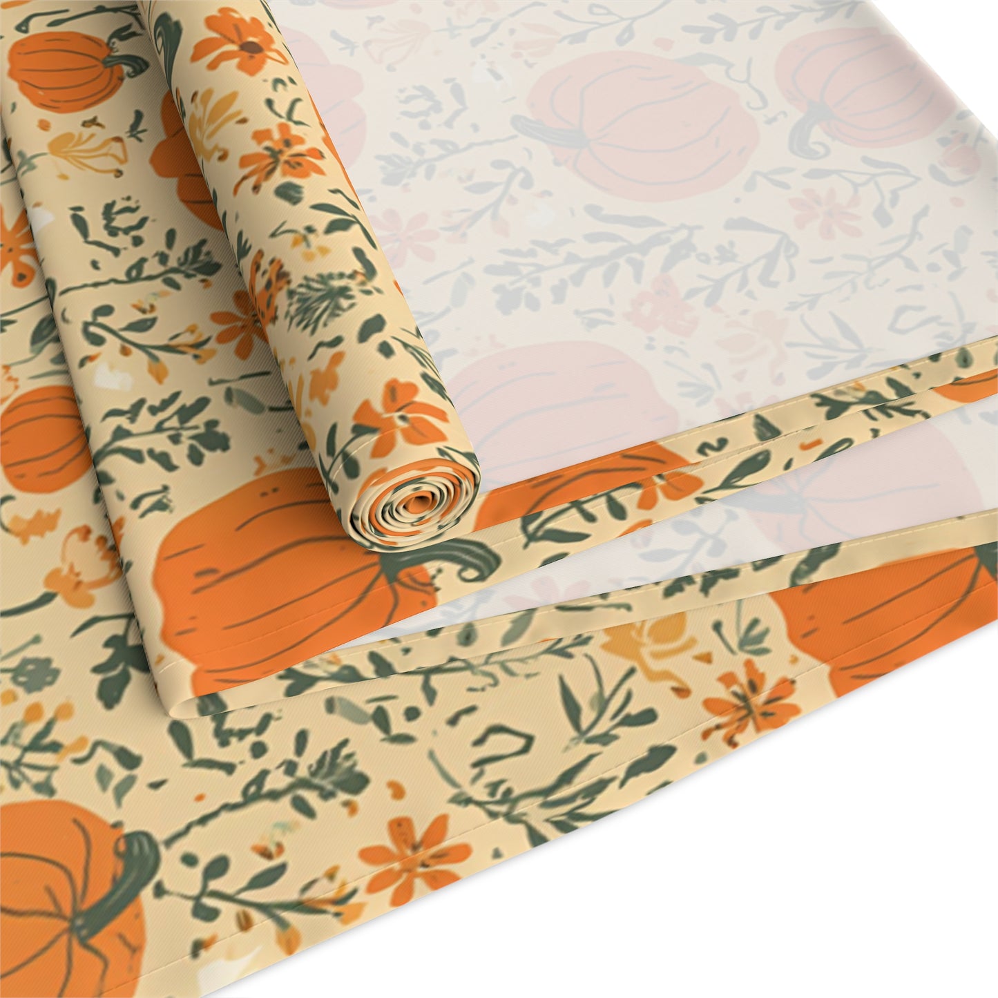 Our Pumpkin Garden table runner has an orange pumpkin and flowers table runner design and is rolled up on a white background