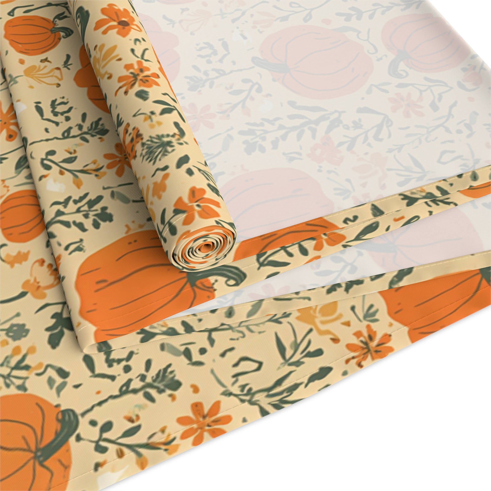 Our Pumpkin Garden table runner has an orange pumpkin and flowers table runner design and is rolled up on a white background