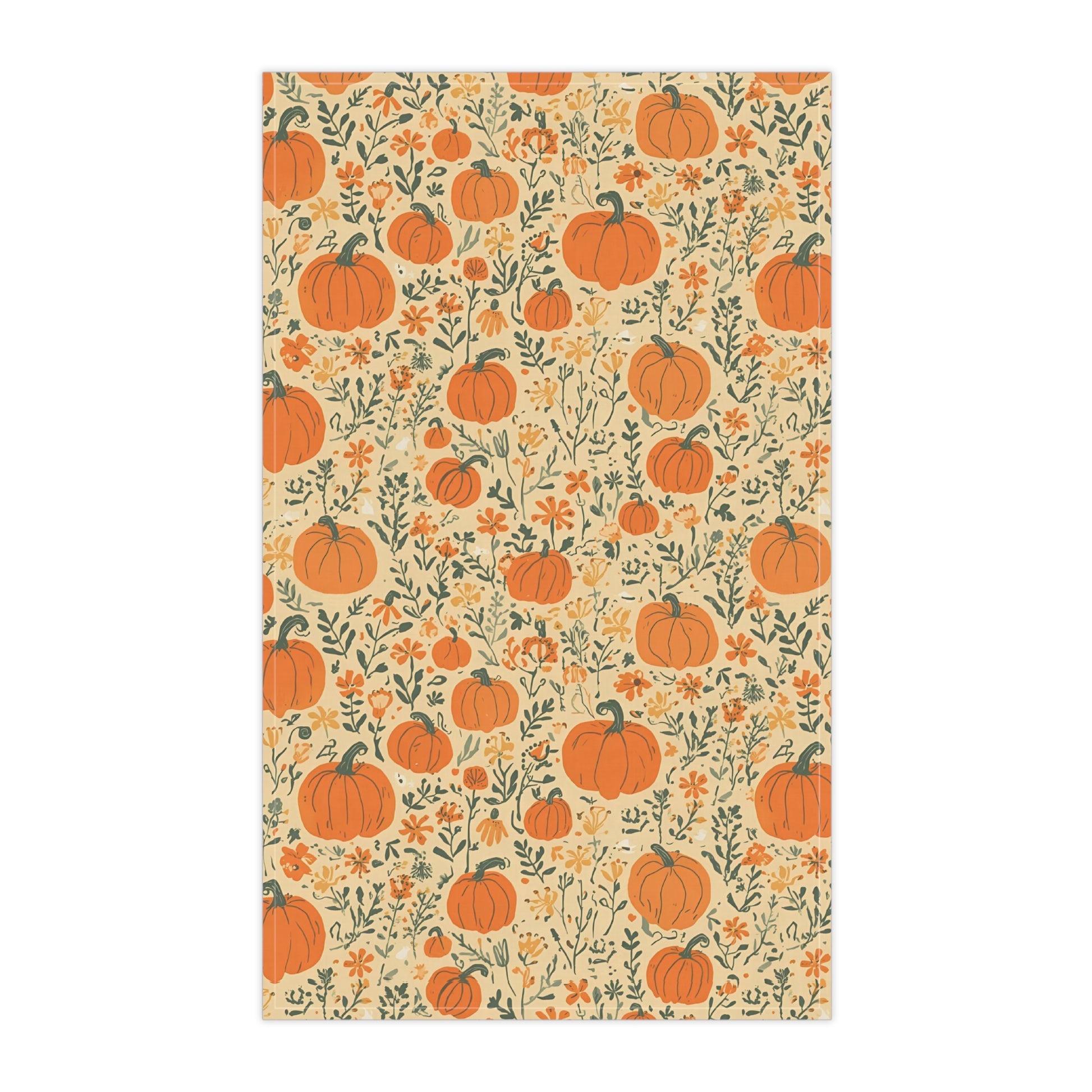 Kitchen tea towel with orange pumpkins and green leaves on a beige background