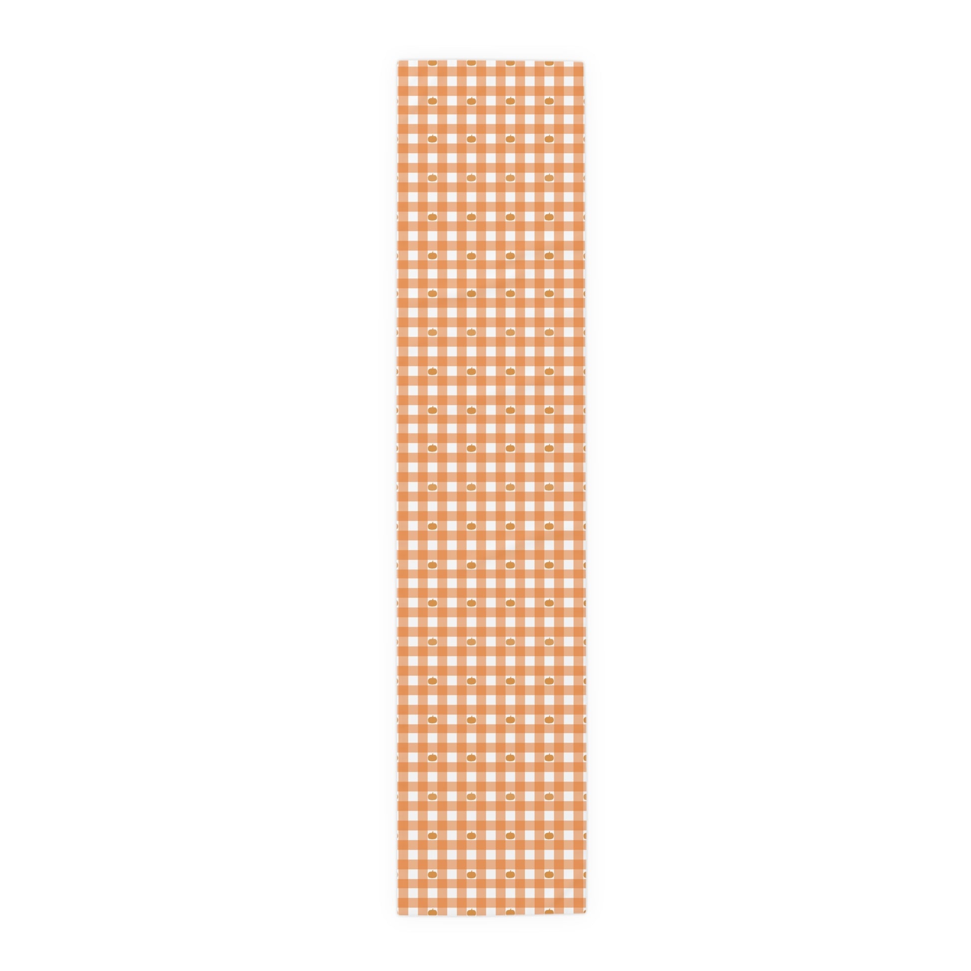 Our 16" x 72" polyester Pumpkin Gingham table runner has an orange and white checkered pattern with small pumpkins on the table runner fabric on a white background