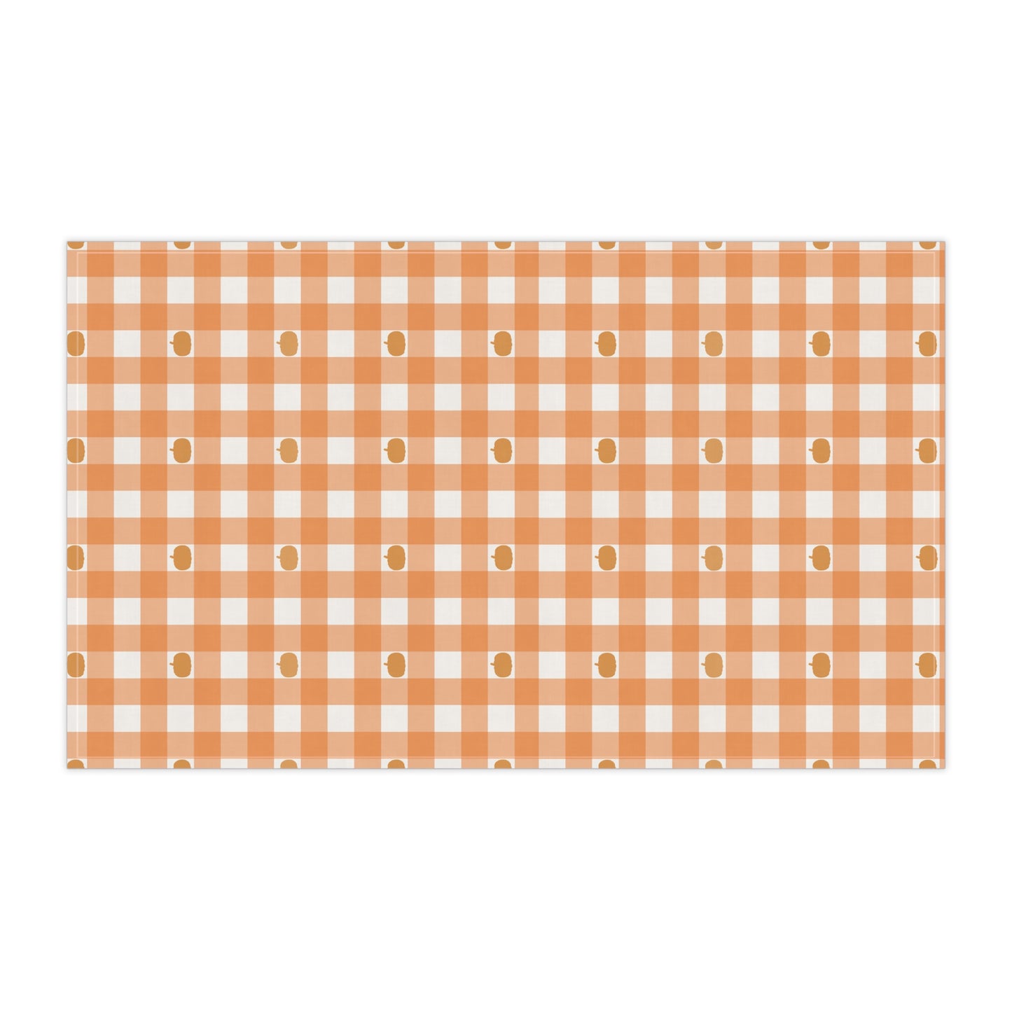Pumpkins, orange and white gingham checkered kitchen tea towel on a white background