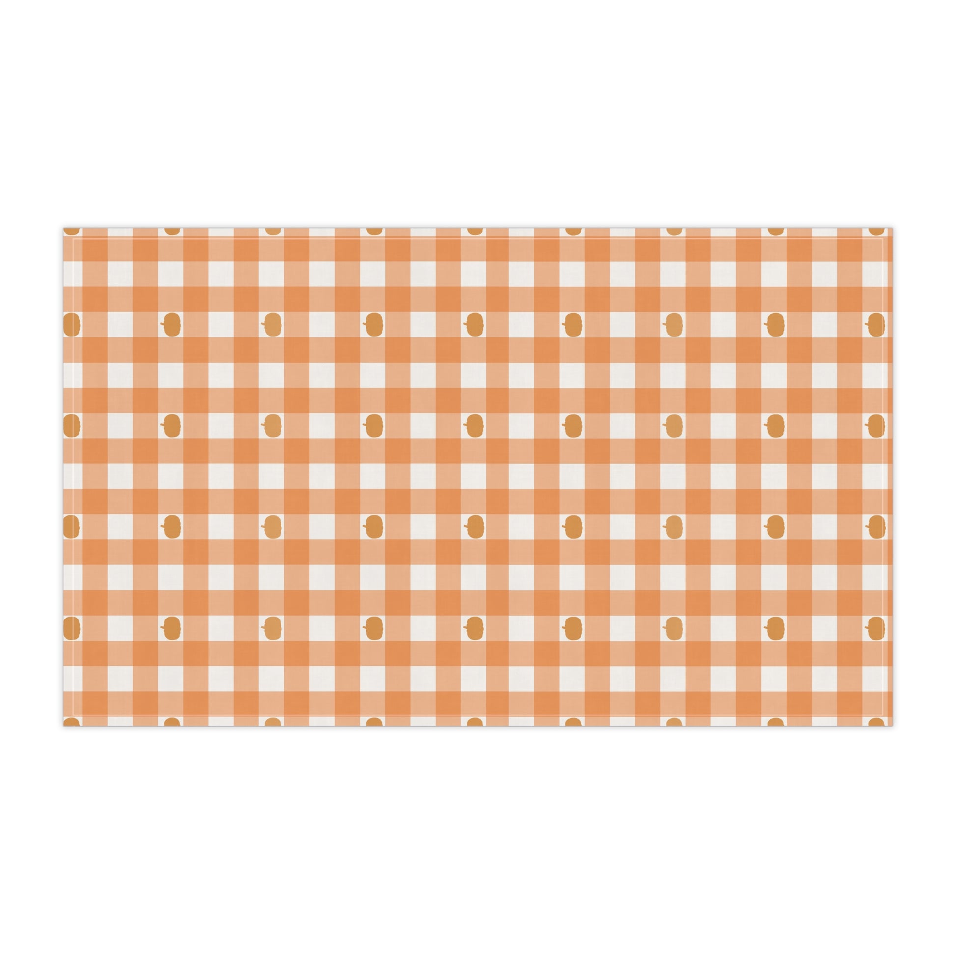 Pumpkins, orange and white gingham checkered kitchen tea towel on a white background