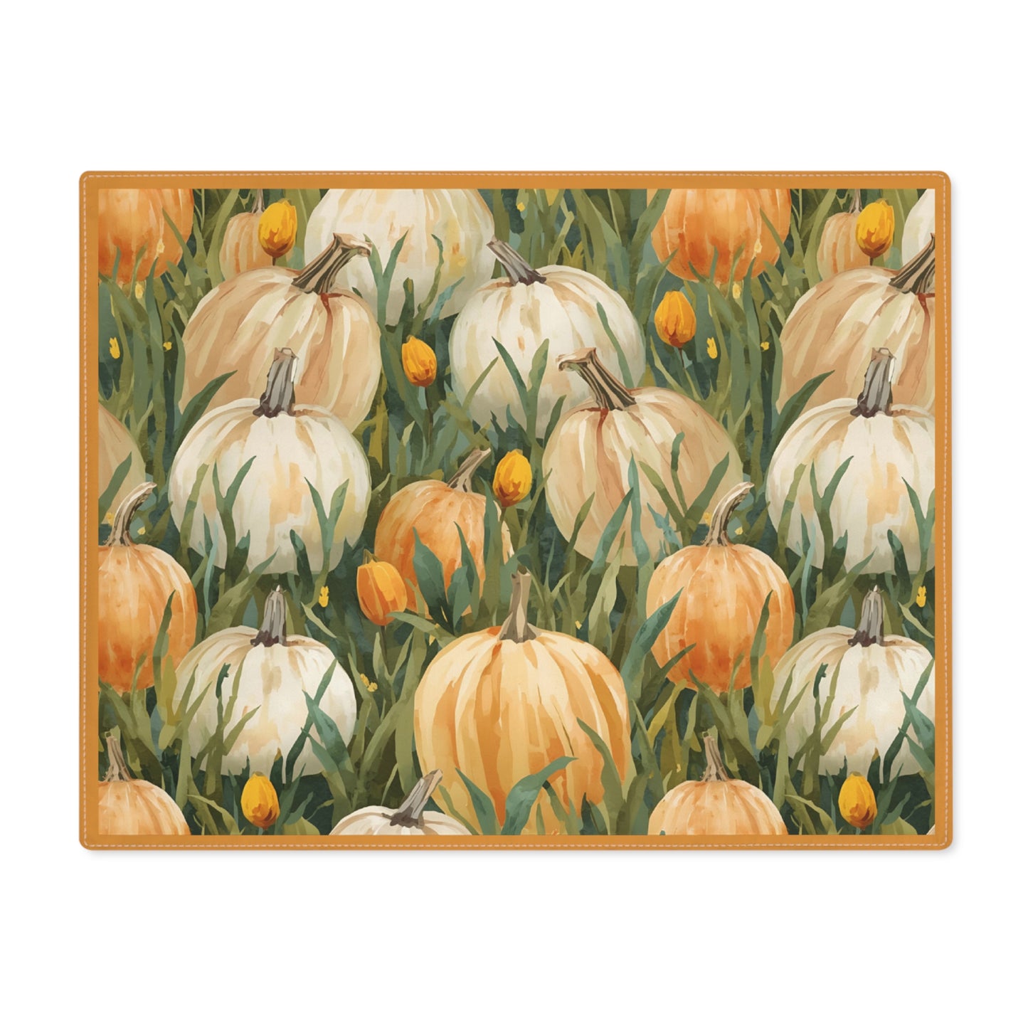 Pumpkin Patch placemat has white and orange pumpkins in grass with orange tulips printed on front of the placemat cotton twill fabric on a white background.