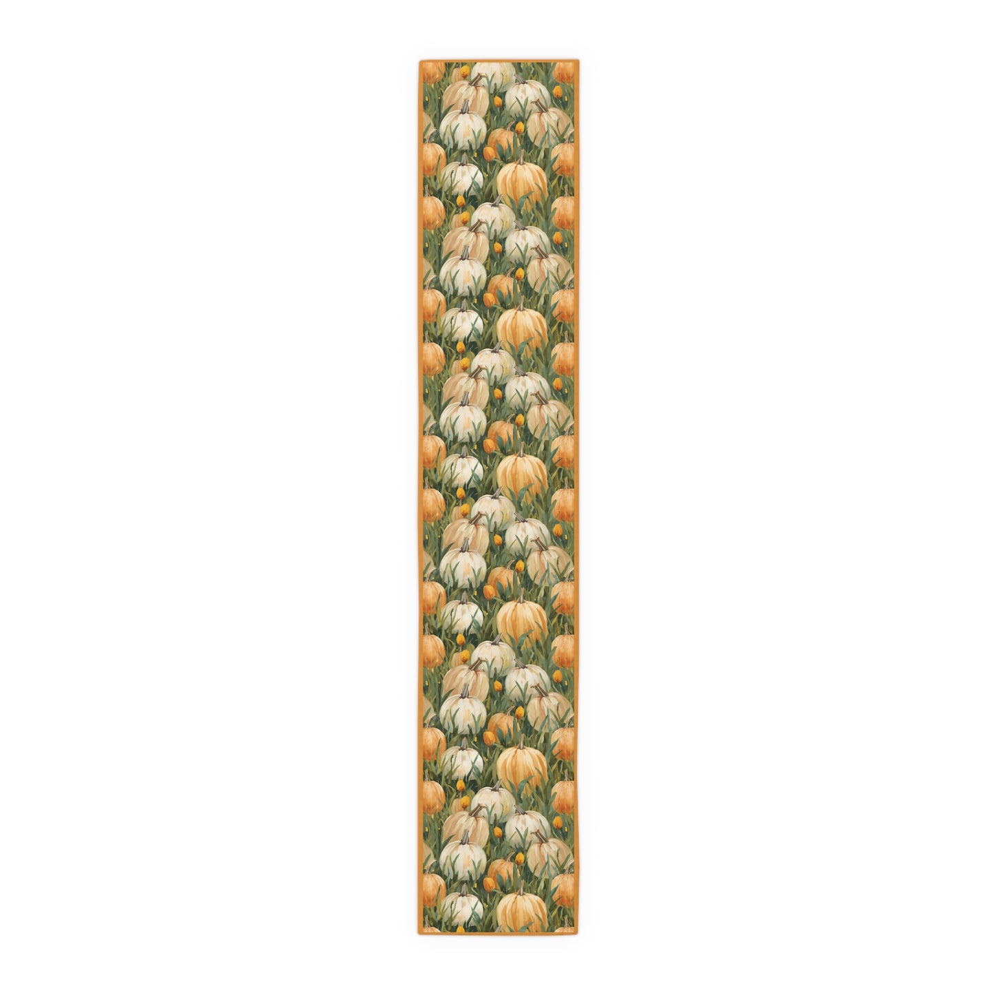Pumpkin Patch table runner has white and orange pumpkins in grass with orange tulips printed on front of table runner polyester fabric and sits on a white background
