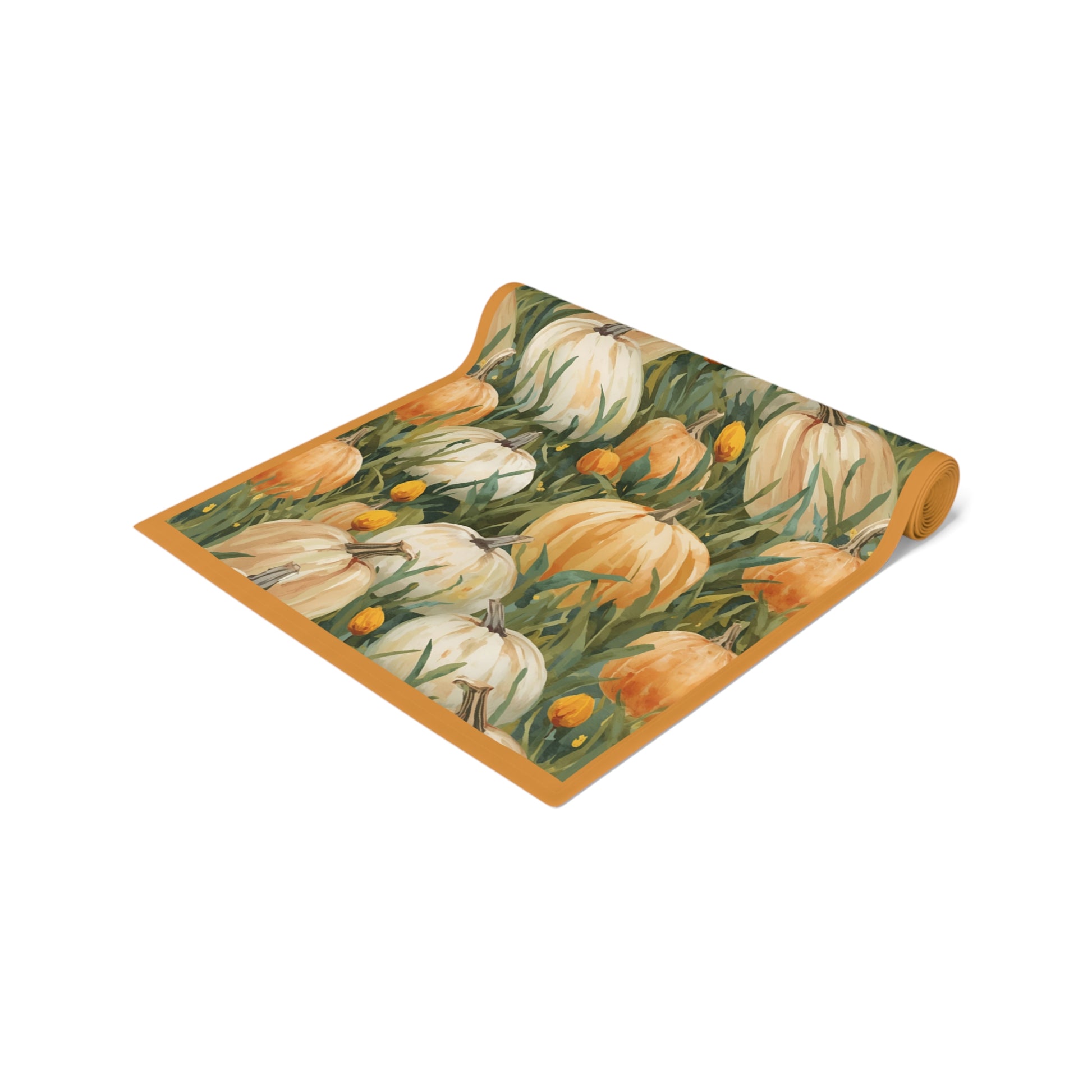 Pumpkin Patch table runner has white and orange pumpkins in grass and tulip field printed on front of polyester fabric and is rolled up on a white background.