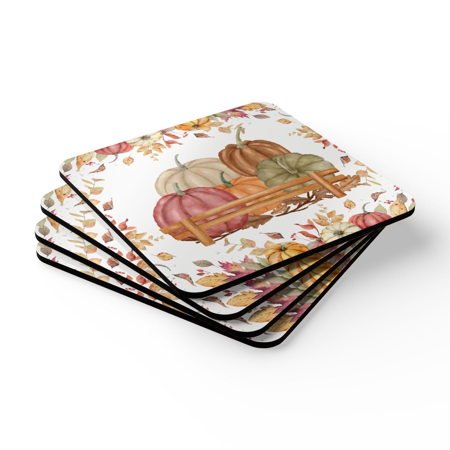 Set of four coasters with autumn design featuring pumpkins and leaves on a white background.