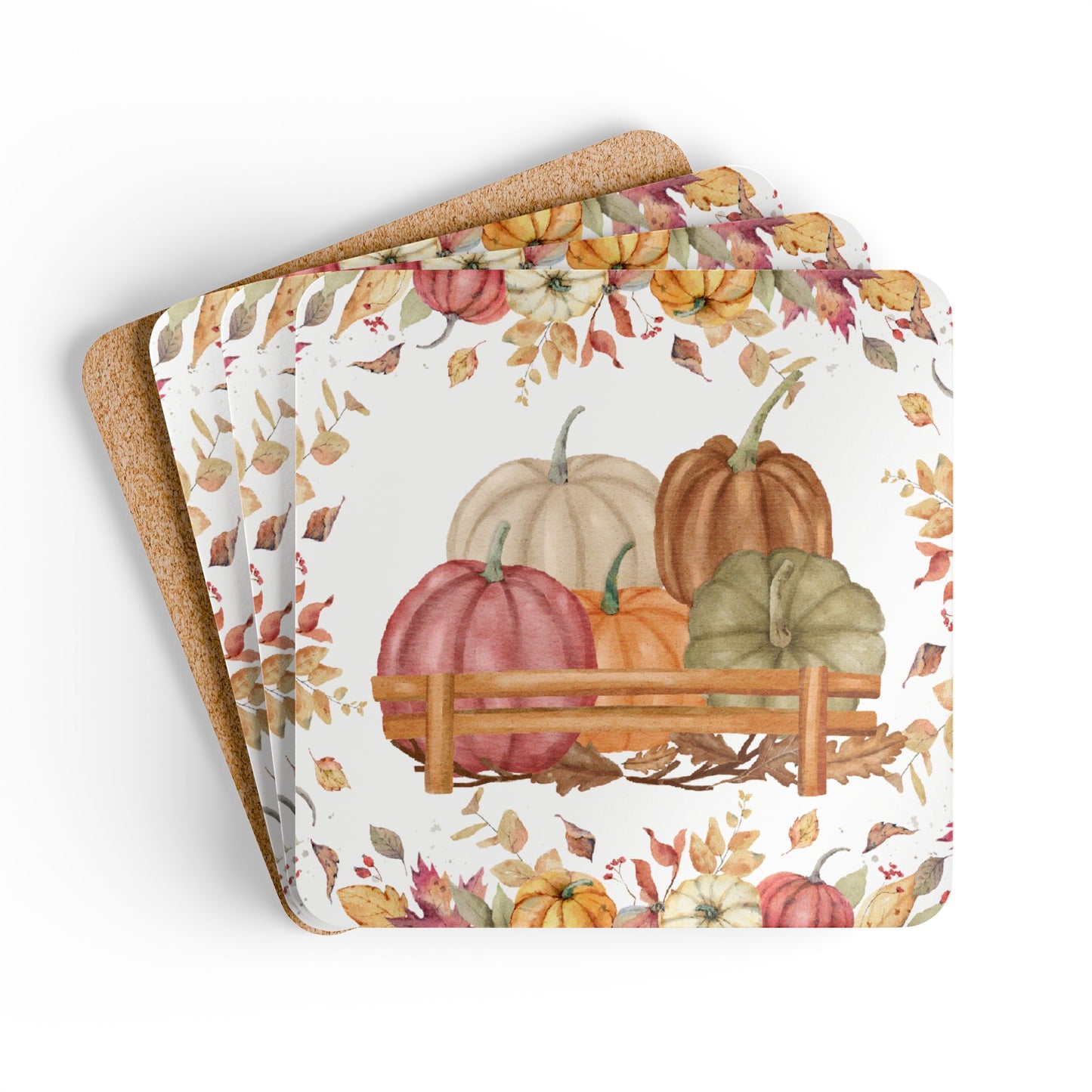 Set of four coasters with autumn design featuring pumpkins and leaves on a white background.