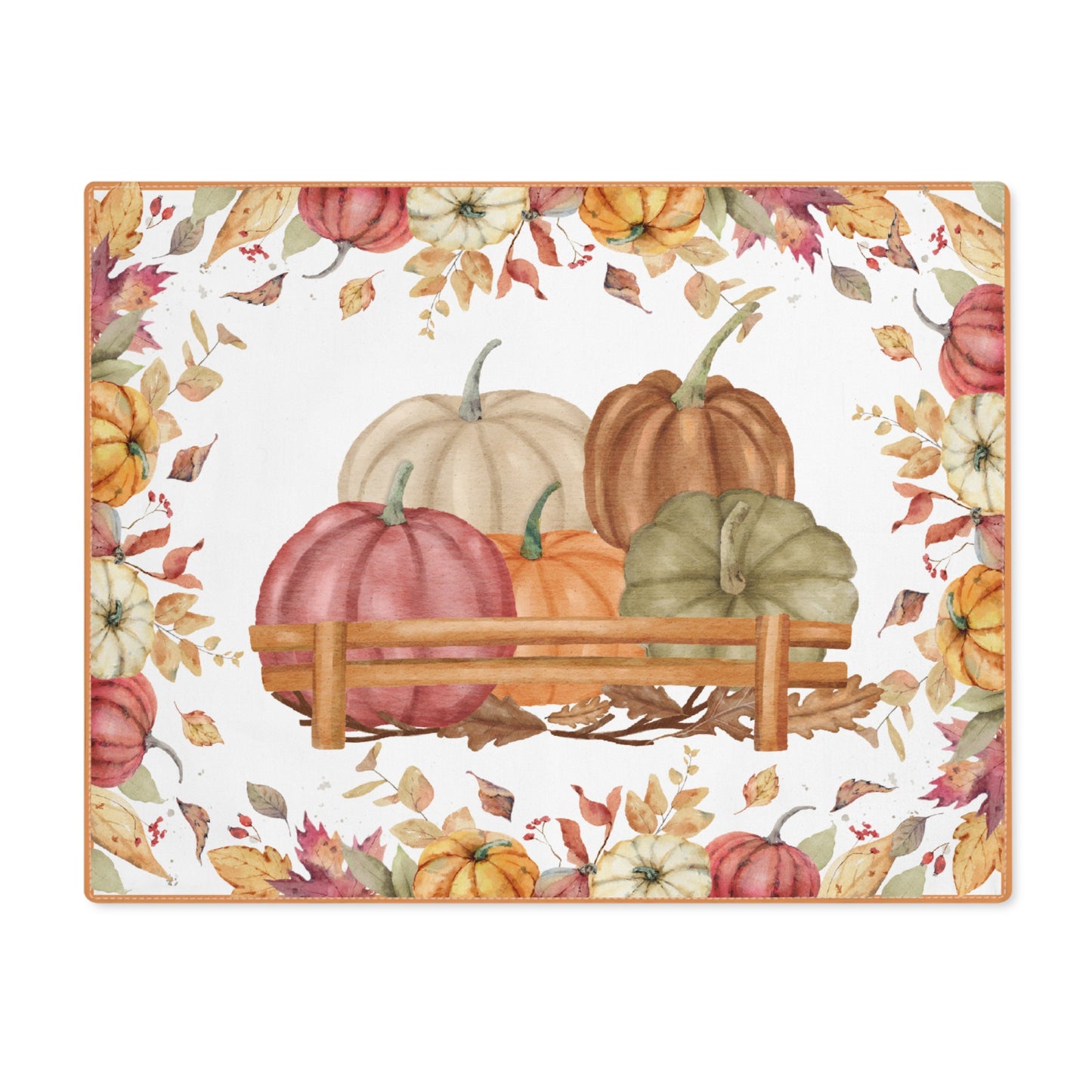 Pumpkins placemat with pumpkins and autumn leaves on the placemat's cotton twill fabric, on a white background