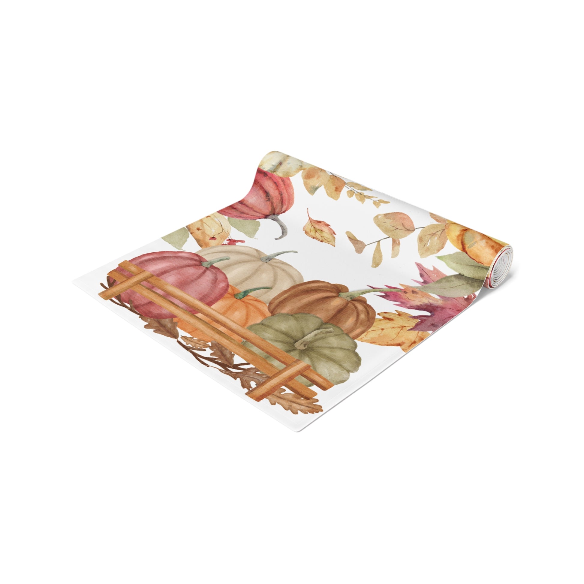Table runner with autumn leaf and pumpkins pattern printed on front of this Pumpkins table runner, rolled up on a white background