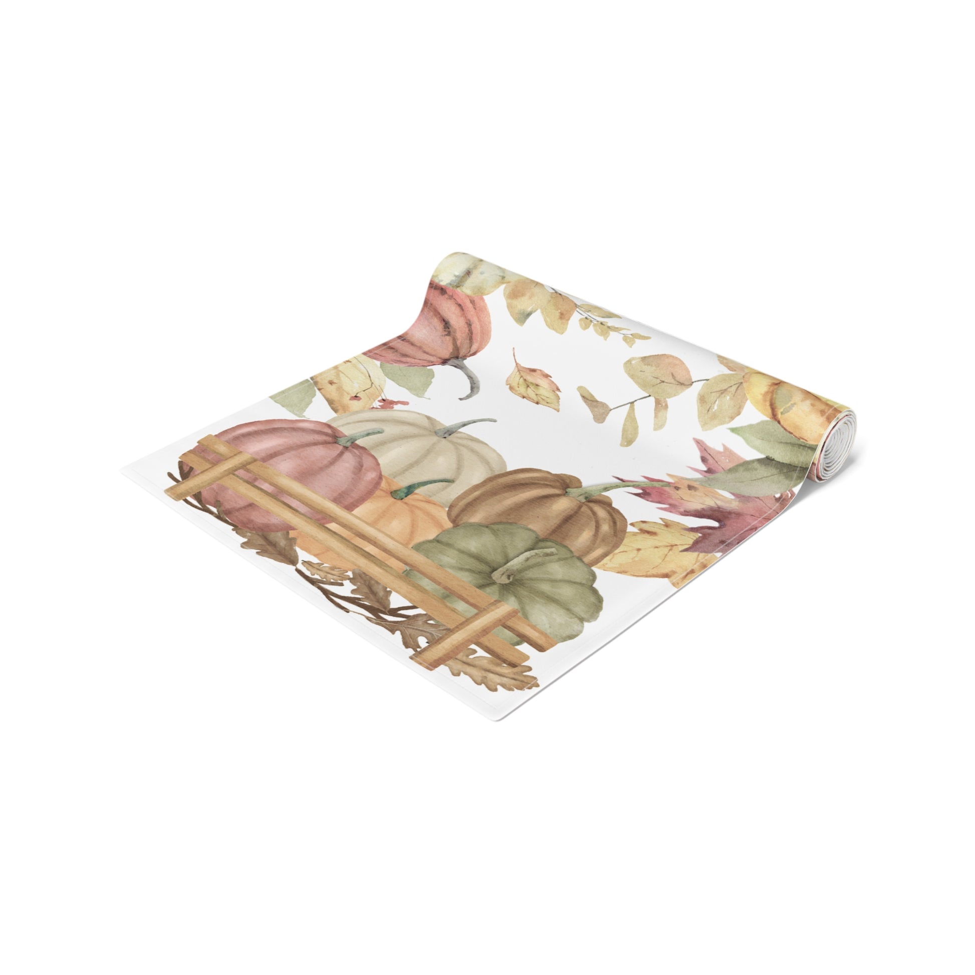Table runner with autumn leaf and pumpkins pattern printed on front of this Pumpkins table runner, rolled up on a white background