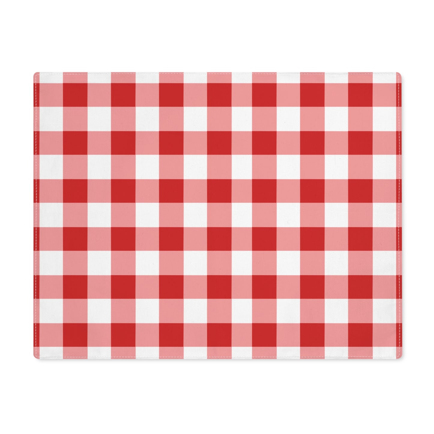 Red gingham placemat with red and white checkered pattern on a white background