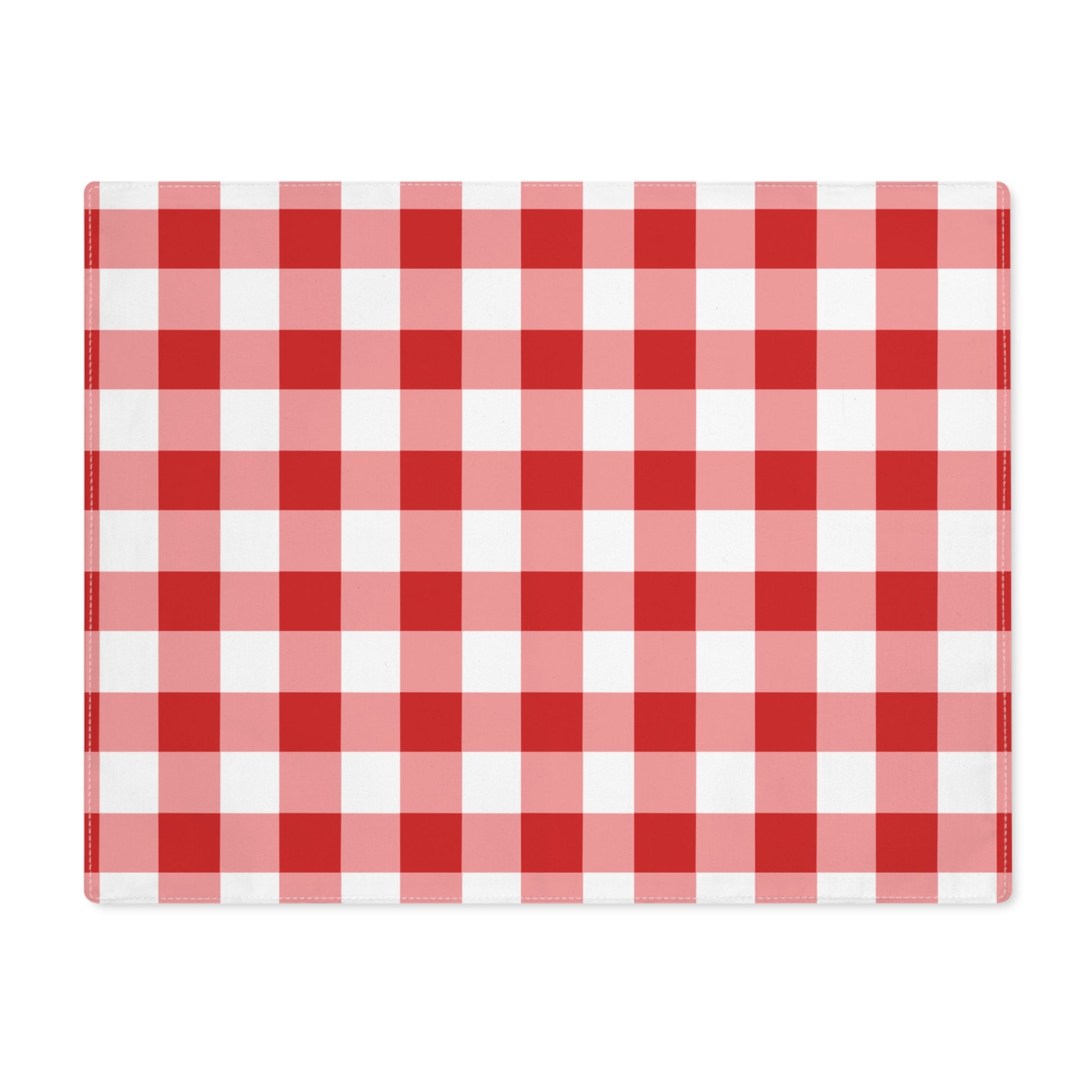 Red gingham placemat with red and white checkered pattern on a white background