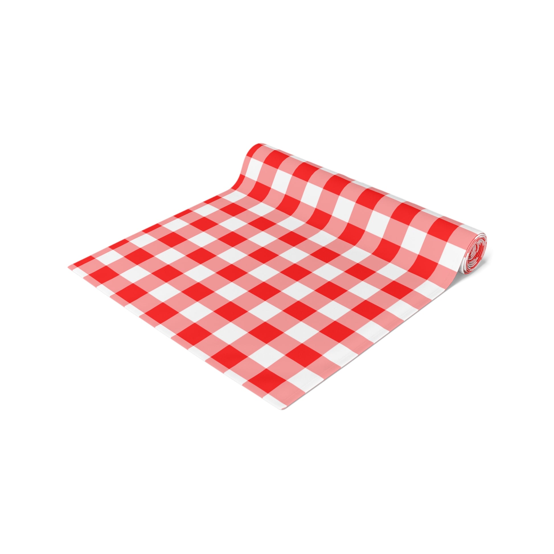 Rolled red and white gingham checkered table runner on a white background