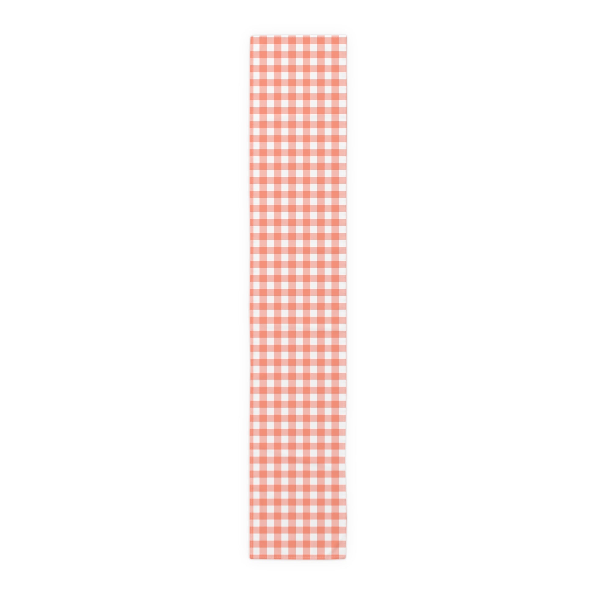 Red and white gingham checkered cotton twill table runner on a white background