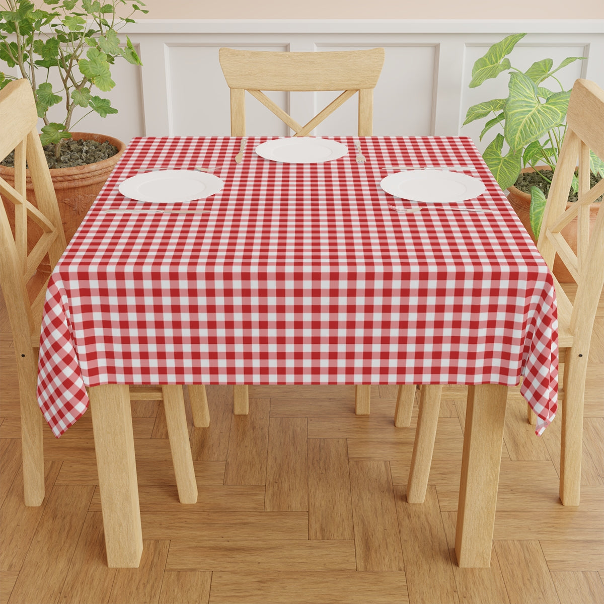 Red and white gingham checkered patterned square tablecloth.