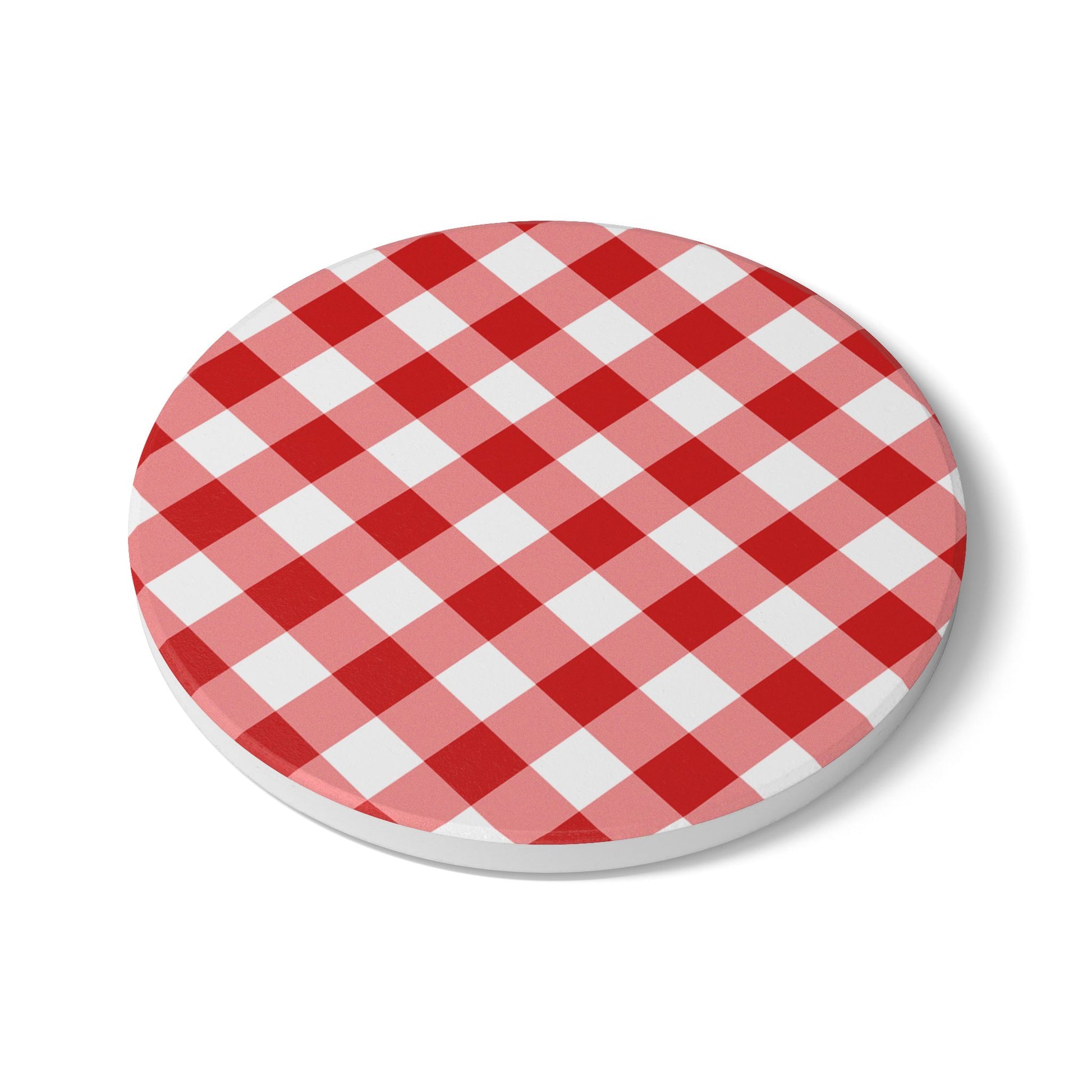 Red gingham round ceramic tile coaster with red and white checkered pattern on front of coaster, on a white background.