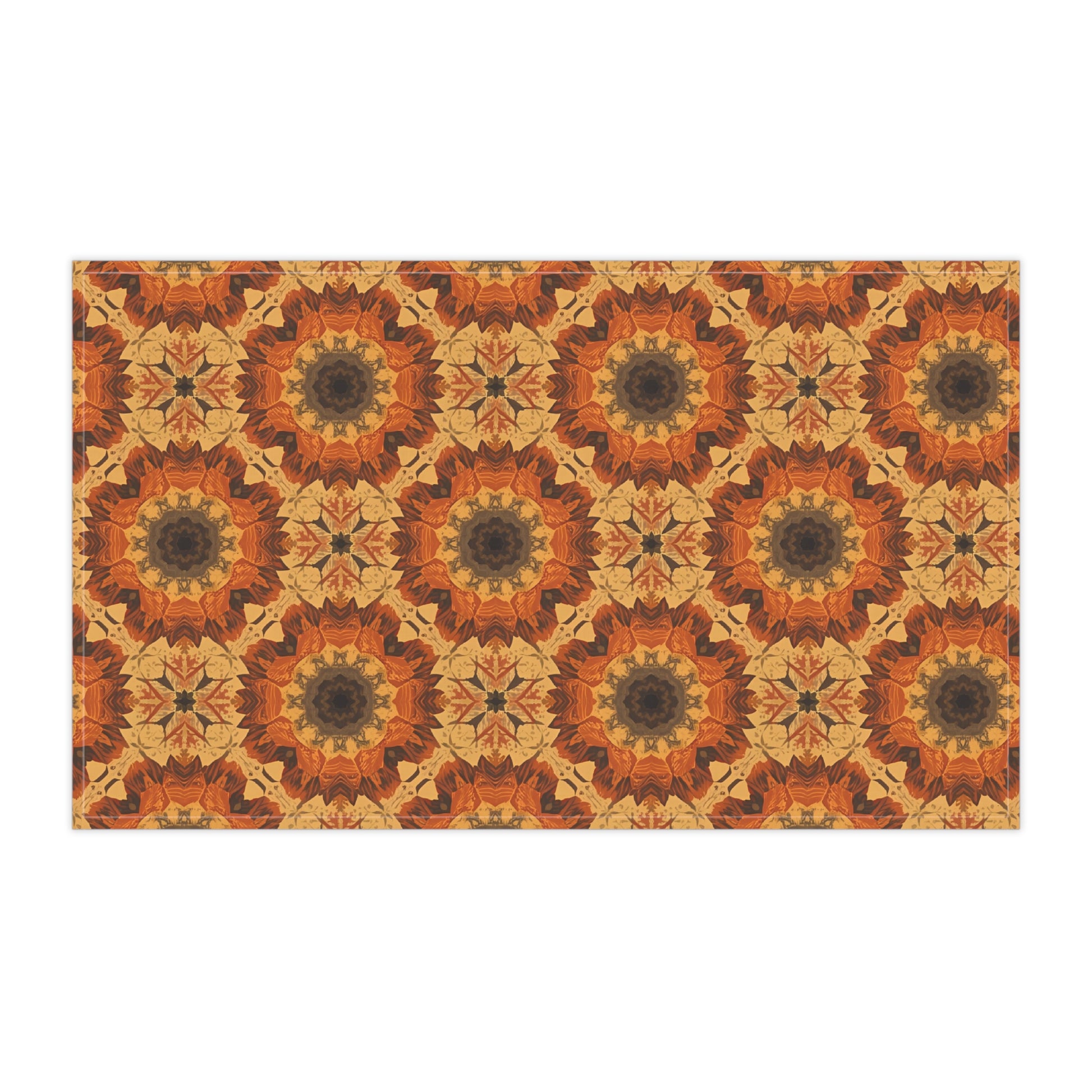 Patterned tea towel with tye-dye orange geometric design on a white background