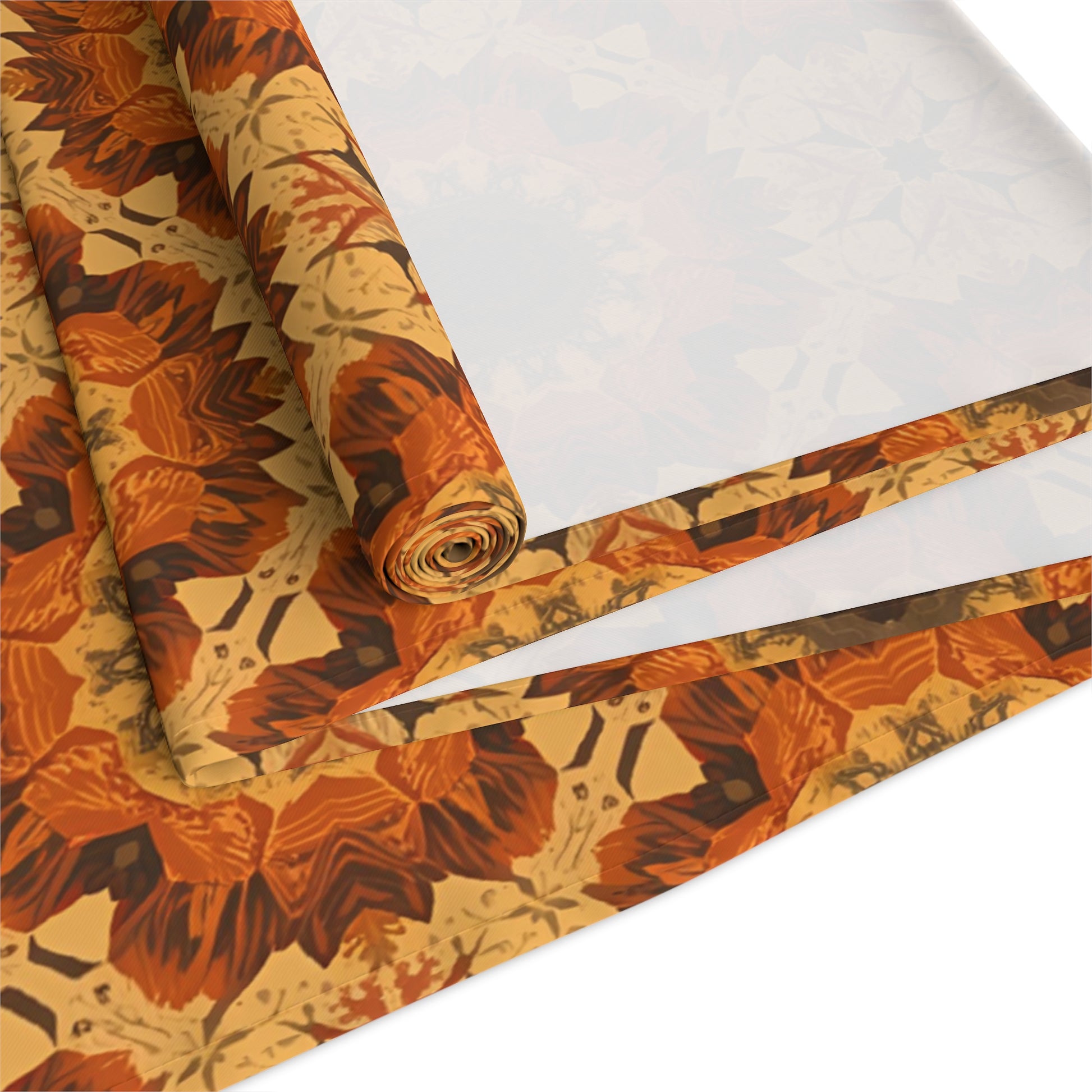 Roll of tye-dye floral-patterned polyester table runner with autumn colors on a white background