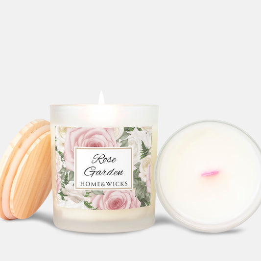 Candle with 'Rose Garden' label with pink wood wick and wooden coaster on a white  background