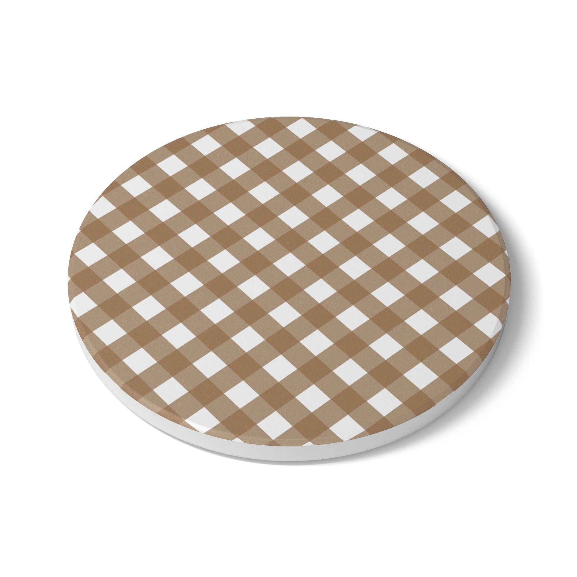 Round ceramic tile coaster with brown and white gingham checkered pattern on a white background