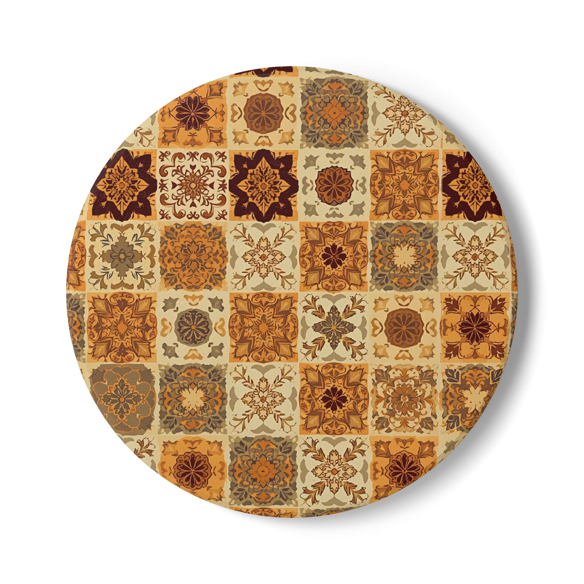 Round ceramic tile coaster with a floral pattern of squares in brown, orange, and beige colors on a white background.