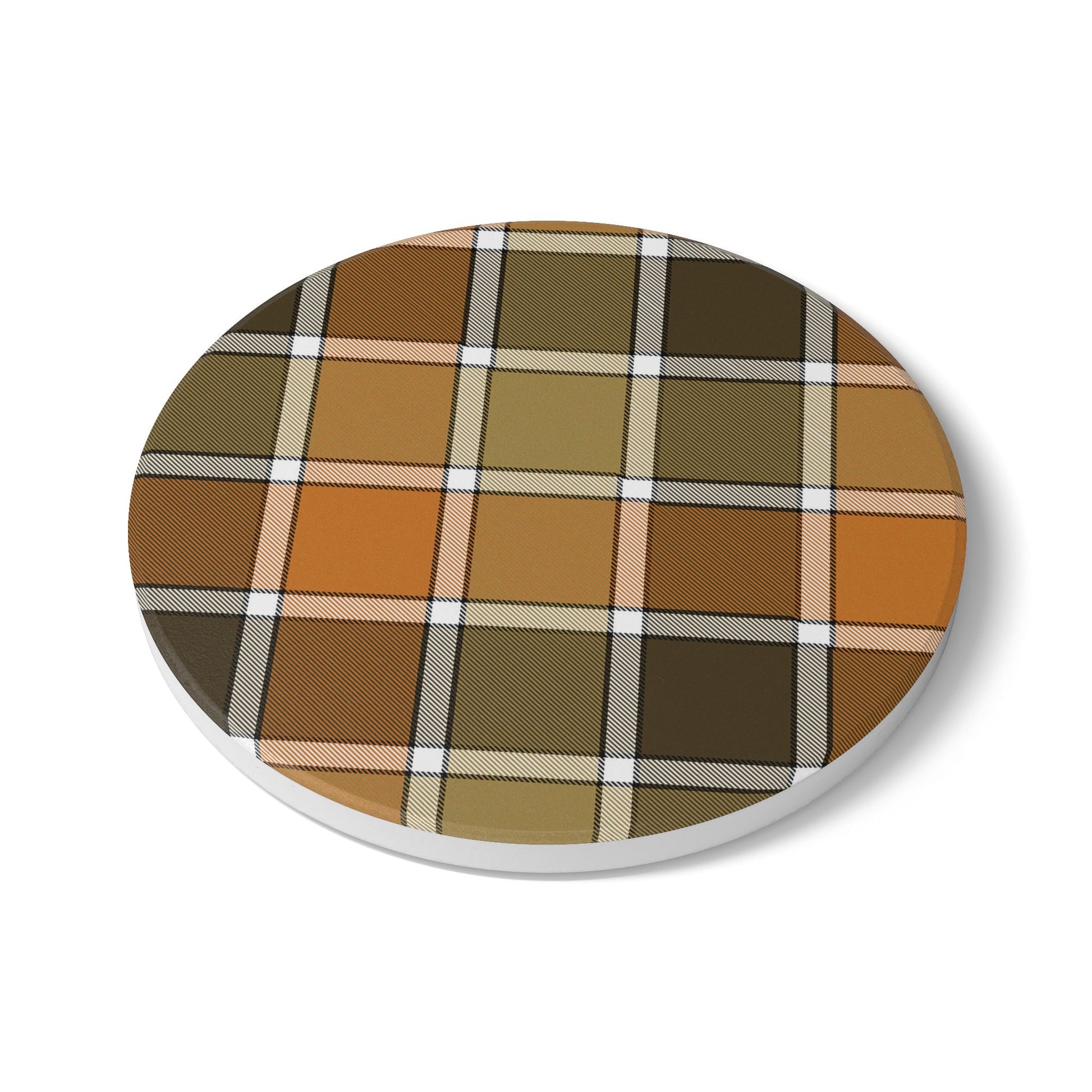 Round ceramic tile coaster with brown, orange and green plaid pattern on a white background