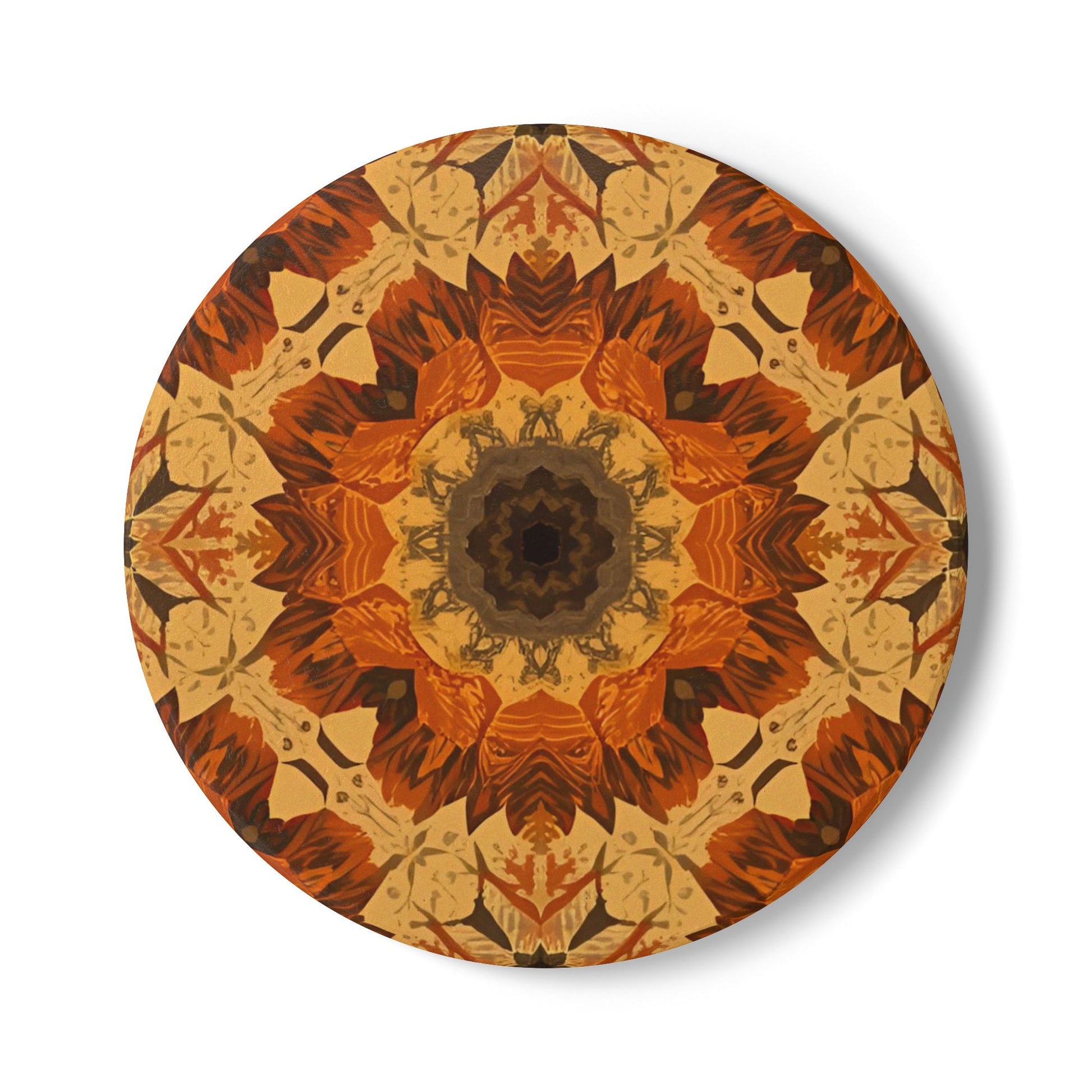 Round ceramic tile coaster with a gray, yellow and orange geometric floral pattern on a white background