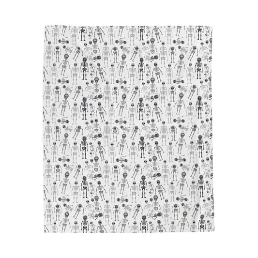 Halloween-themed Skeletons patterned blanket with black and white skeletons on a white background on front of blanket, on a white background