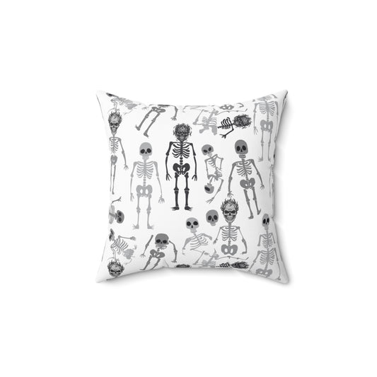 Skeleton square decorative throw pillow with black and white skeleton pattern on both sides of pillow, on a white background